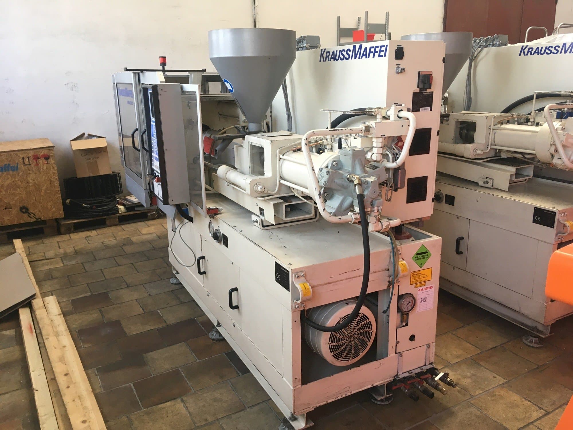 Left side view of Krauss Maffei 80/390 C2 machine
