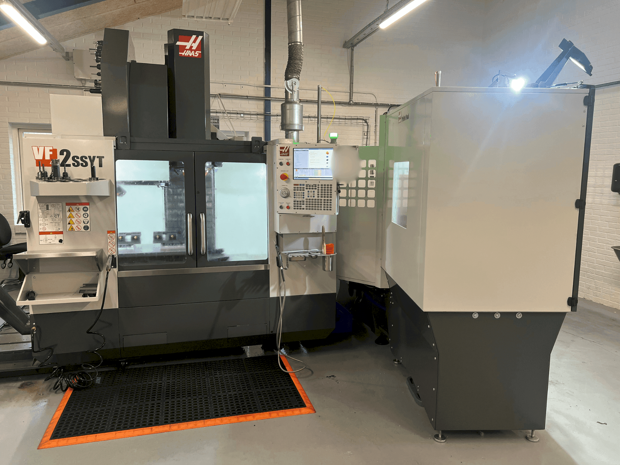 Front view of HAAS VF-2SSYT machine