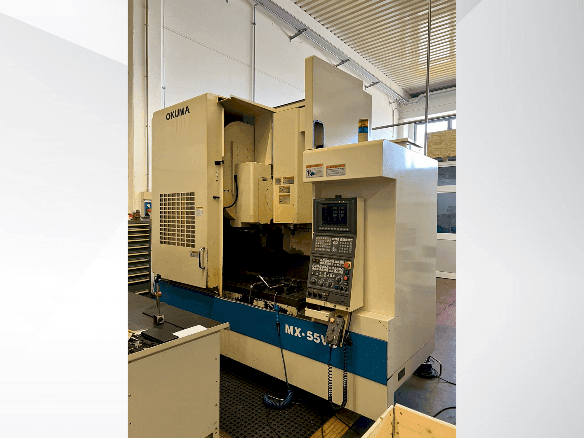 Front view of Okuma MX-55VB machine