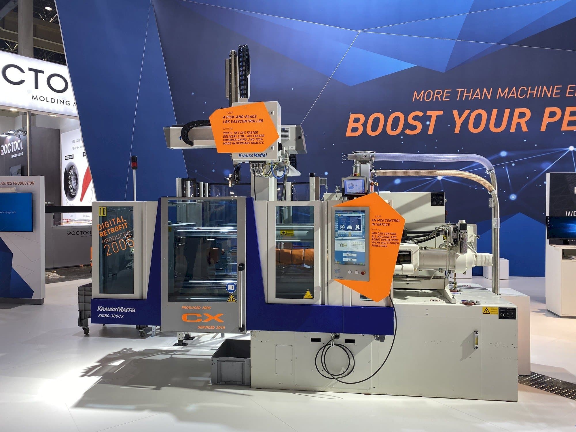 Front view of Krauss Maffei 80-380 CX + LRX easyControl 100 machine