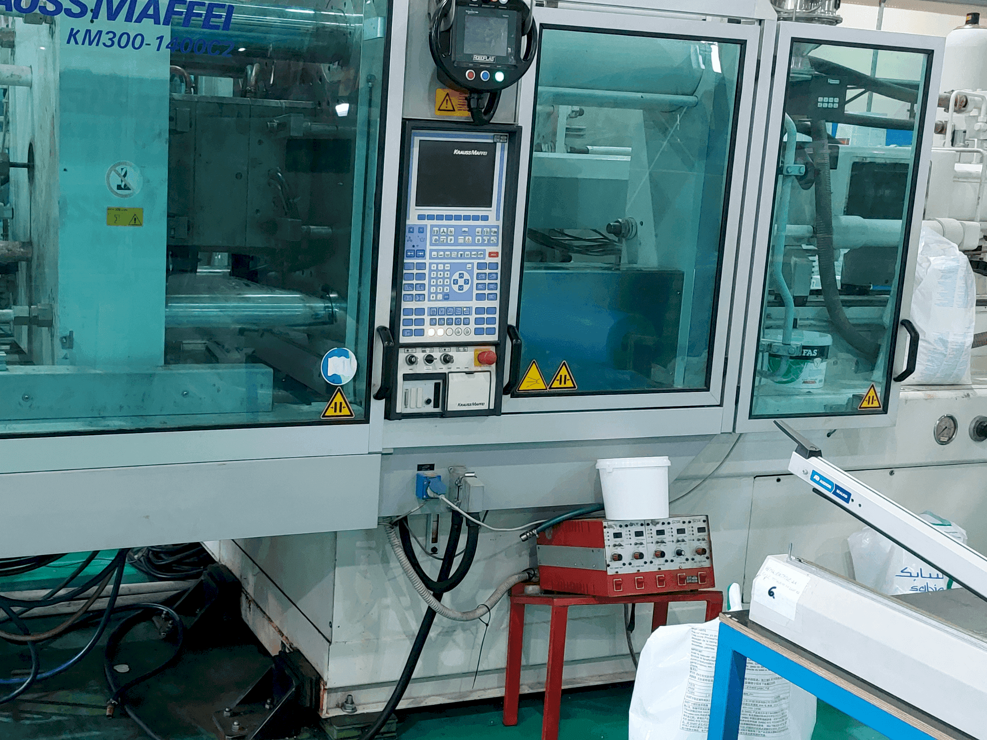 Front view of Krauss Maffei 300 – 1400 C2  machine