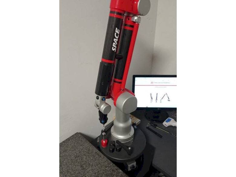 Front view of Tomelleri Engineering Space - 6 Axes machine