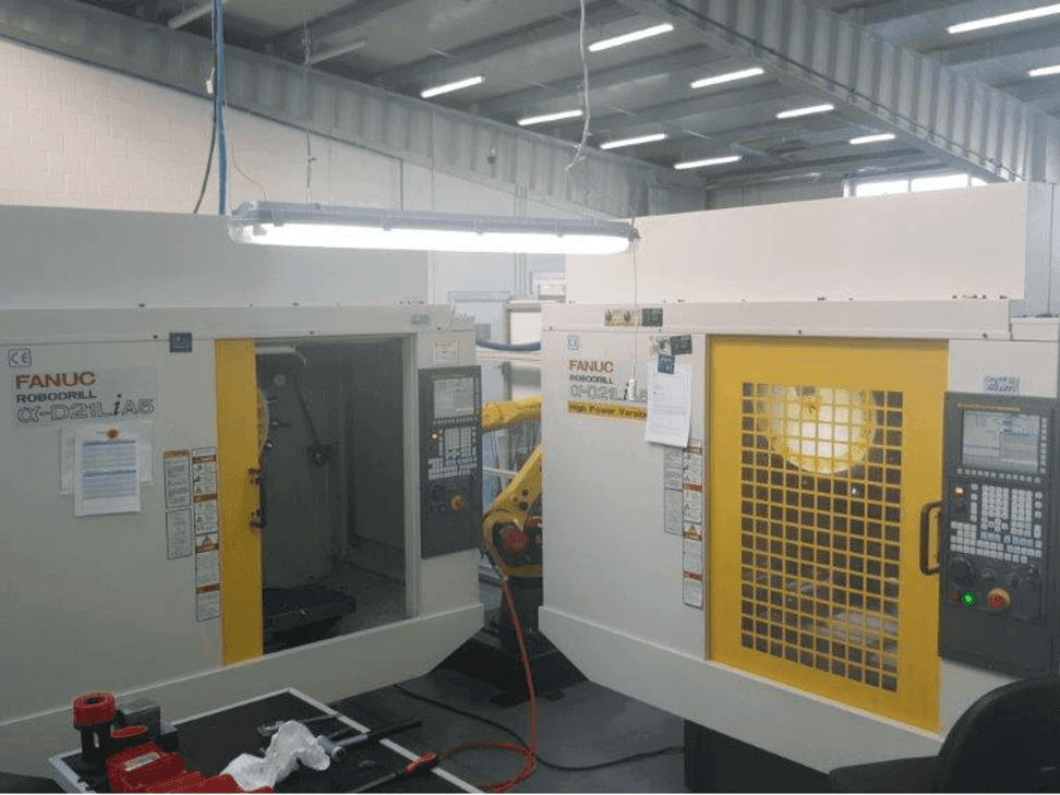 Front view of FANUC RoboDrills D21LiA5 + M20iA/M35 machine