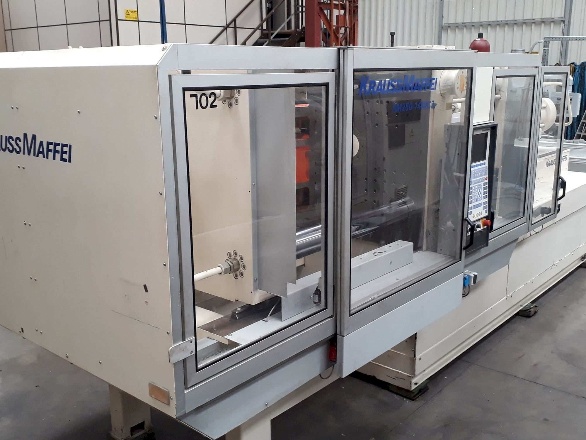 Front view of Krauss Maffei 250-1400 C2  machine