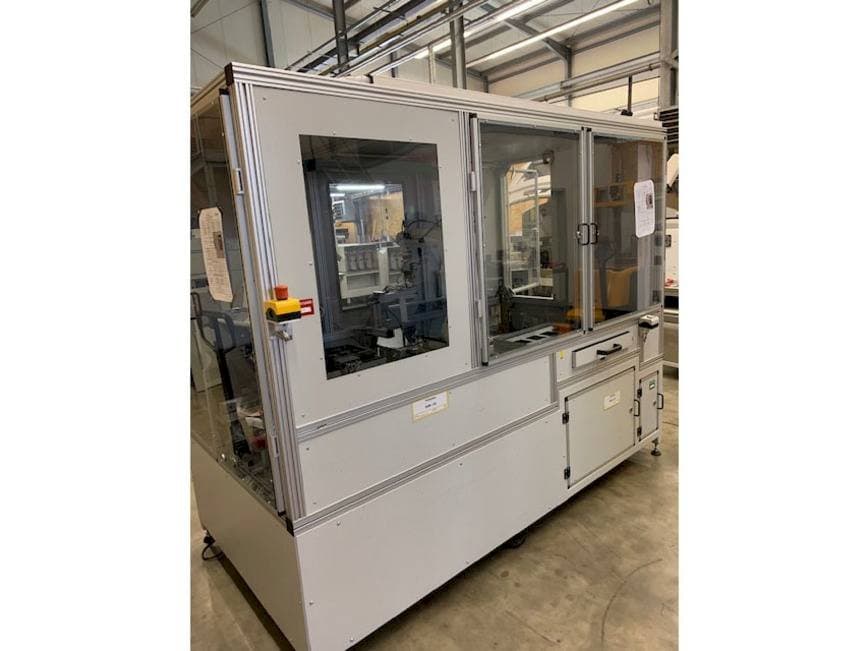 Left side view of SEHO Robot cell sorting station machine