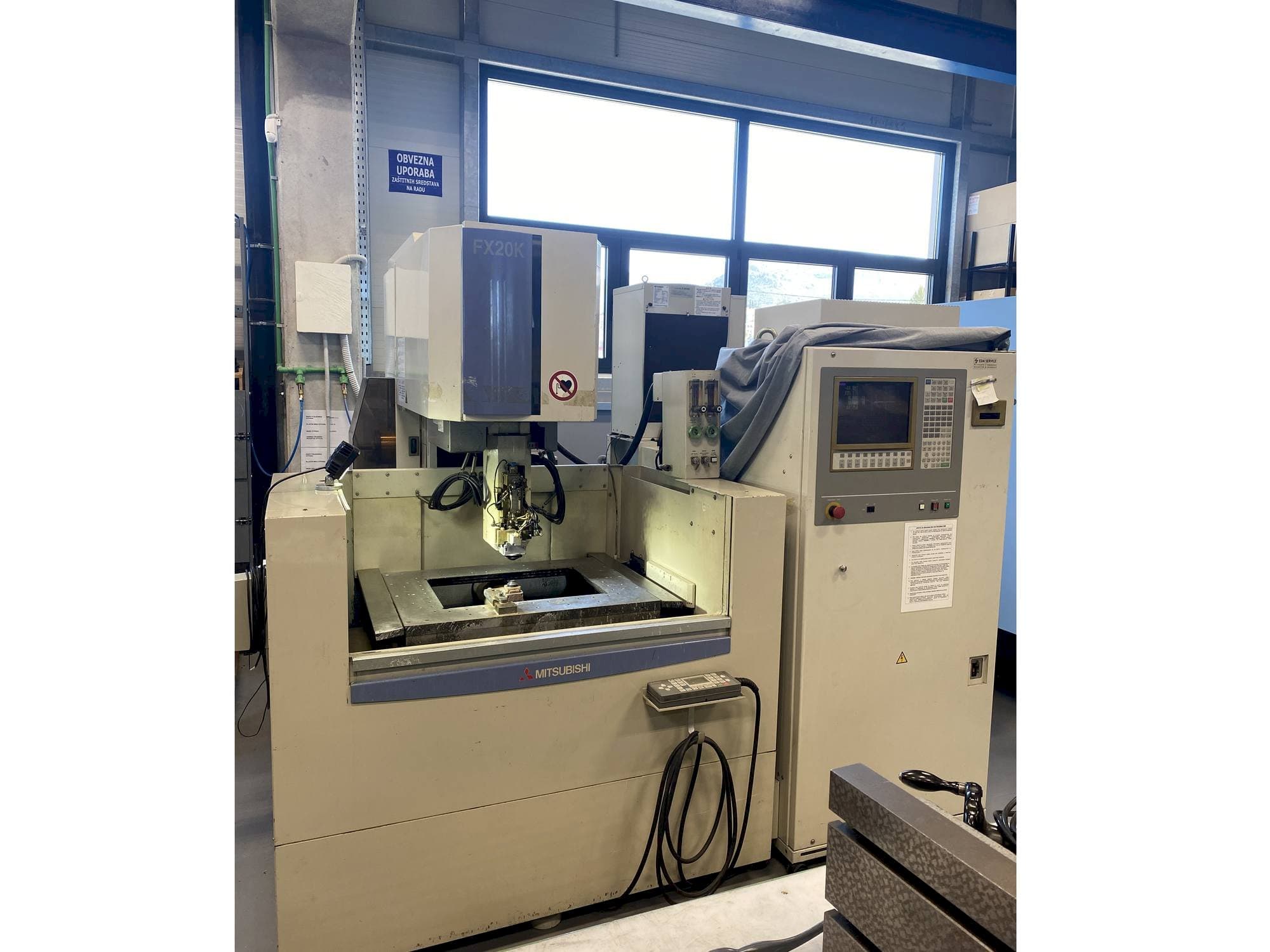 Front view of Mitsubishi FX20K machine