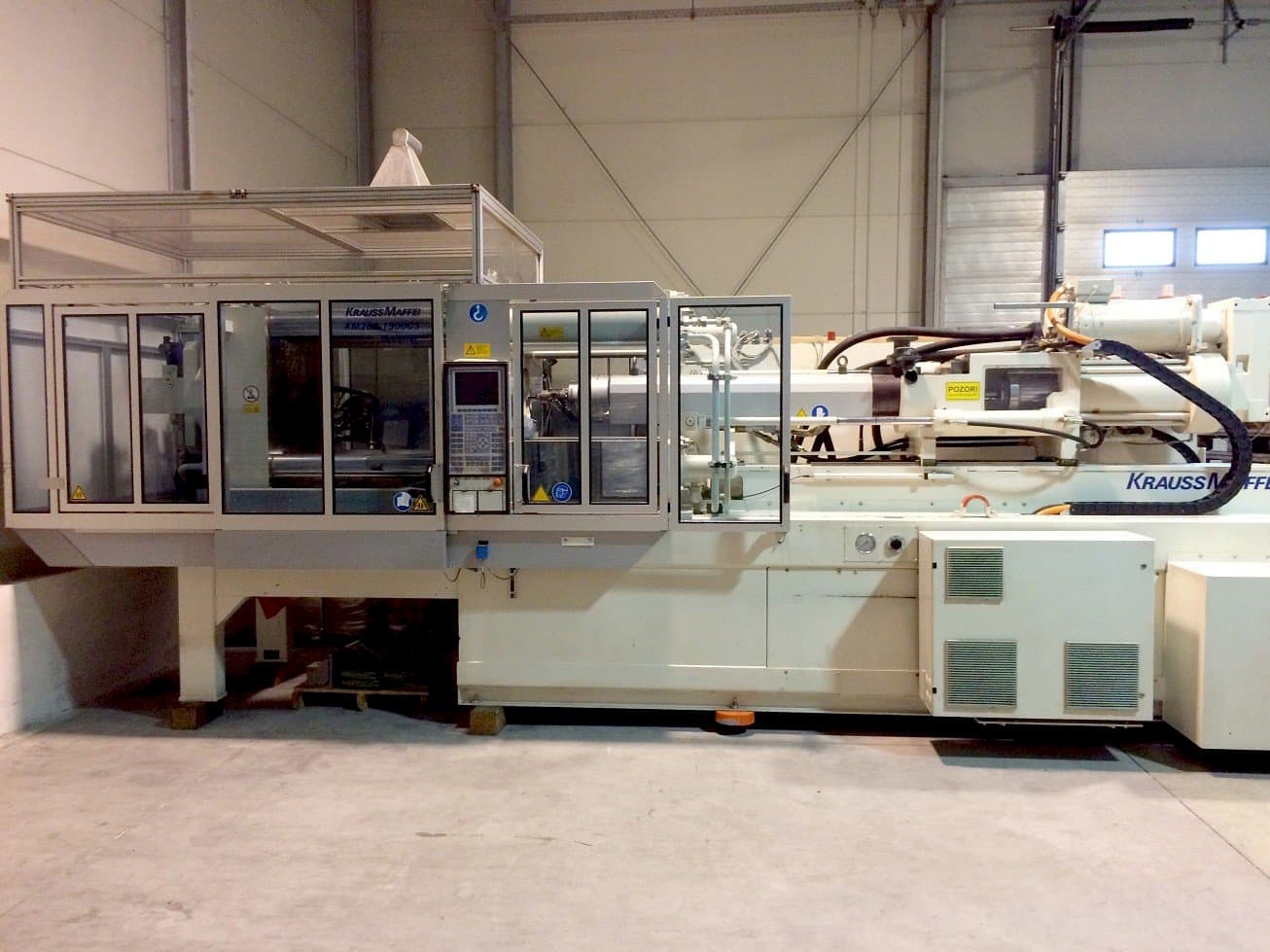 Front view of Krauss Maffei KM 280-1900 C3 machine