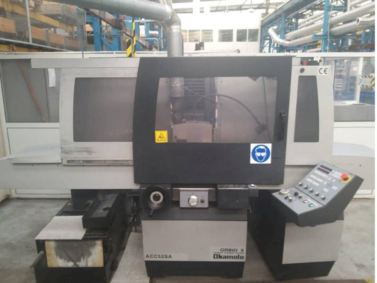 Front view of OKAMOTO ACC 52SA machine