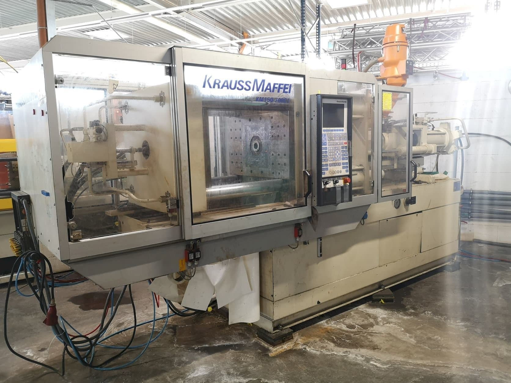 Front view of Krauss Maffei 150-700 C1 machine