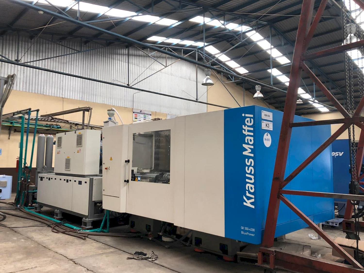 Front view of Krauss Maffei 550-4300 GX machine