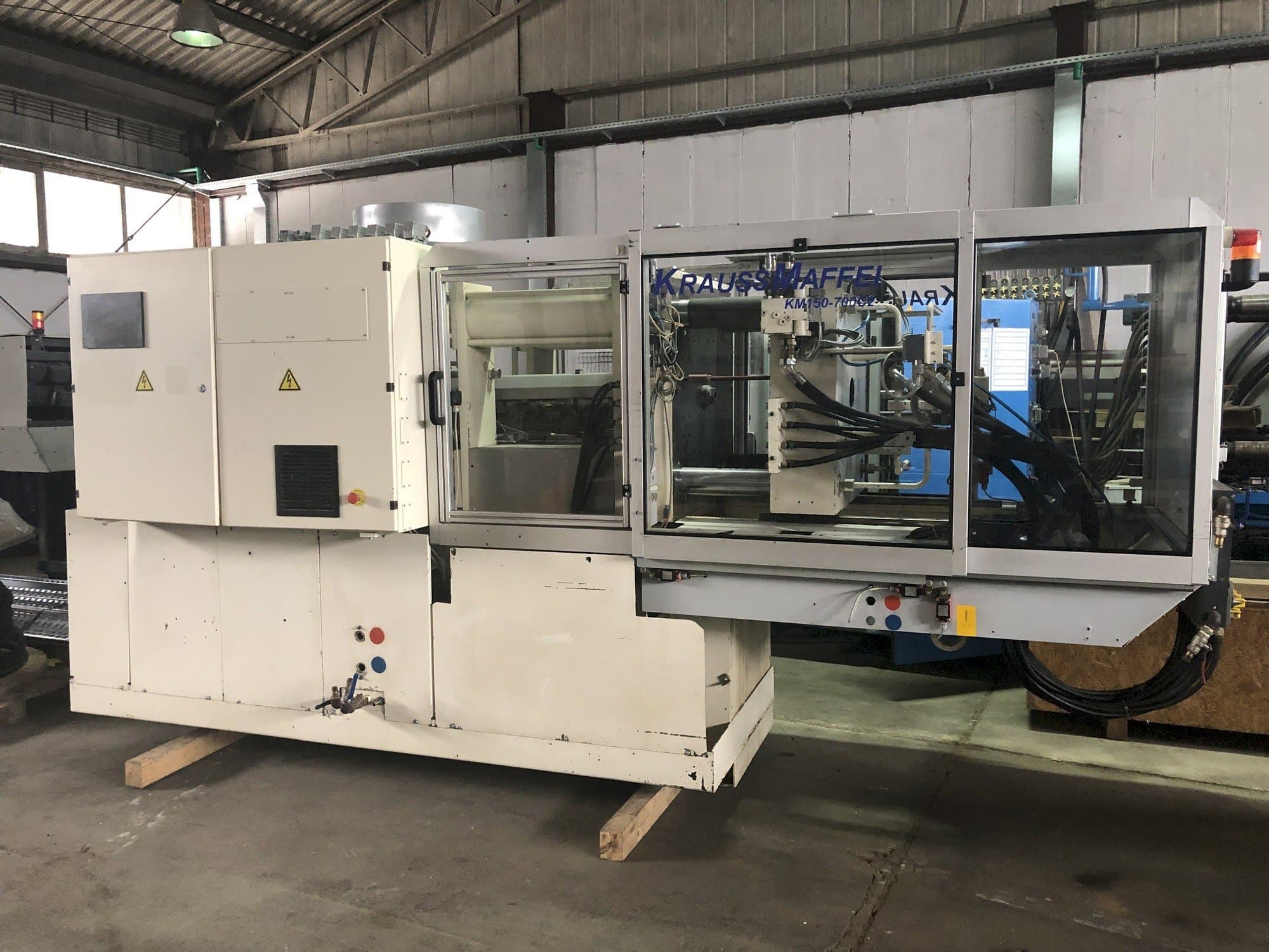 Front view of Krauss Maffei 150-700 C2 machine