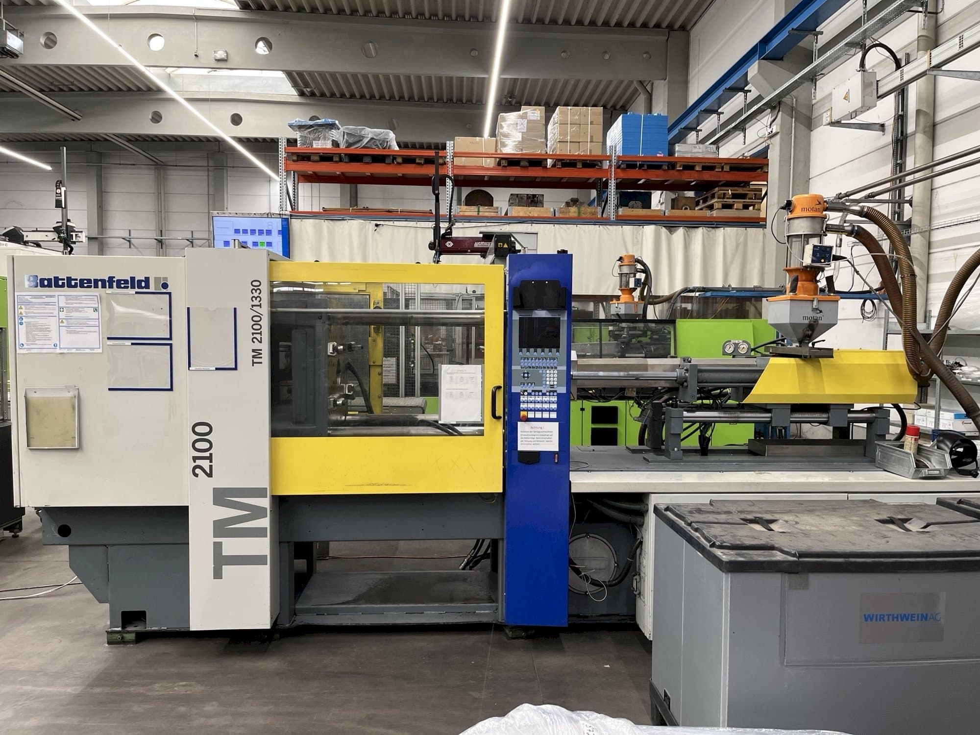 Front view of Battenfeld TM2100/1300 machine
