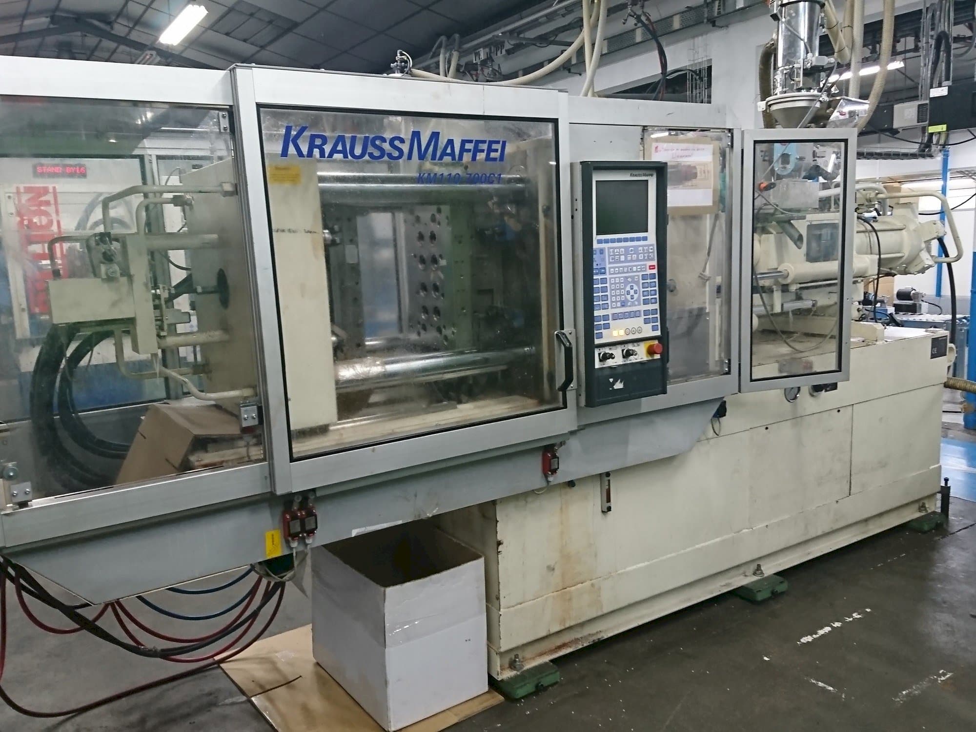 Front view of Krauss Maffei 110 - 700 C1  machine