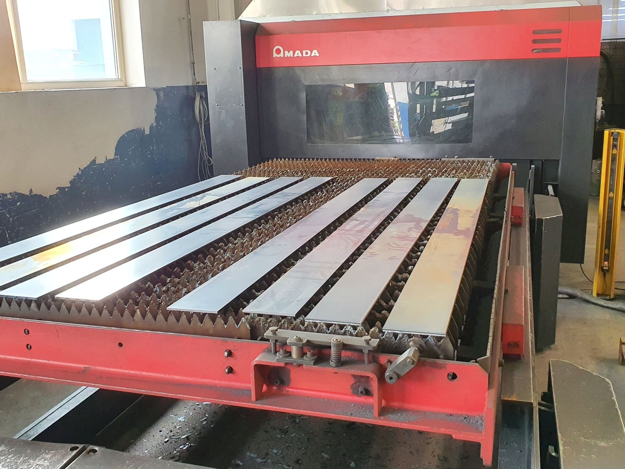 Front view of AMADA FO-3015 MII NT CI machine