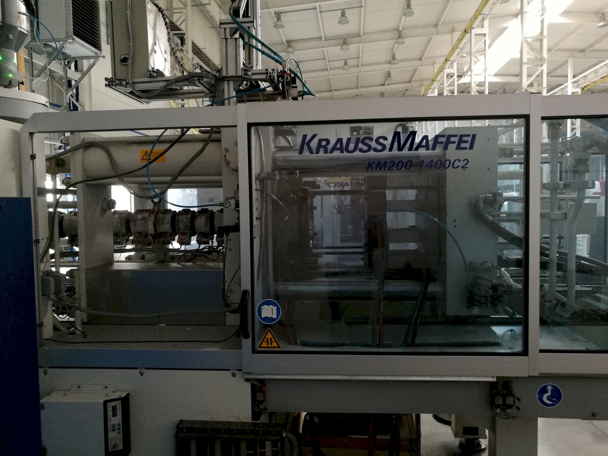 Front view of Krauss Maffei 200-1400 C2 machine