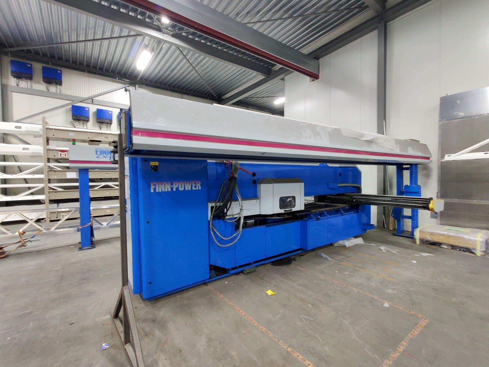 Front view of Finn-Power F6-25 SB/AM + FMM 300 / 1 / UT automation  machine