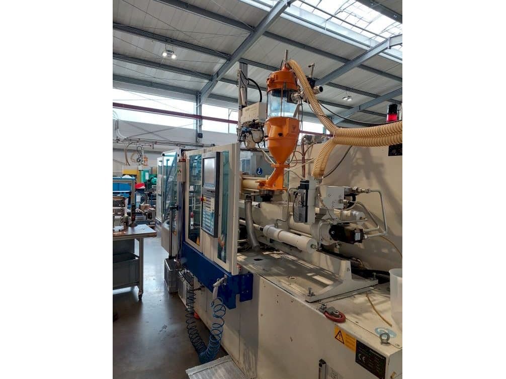 Front view of Krauss Maffei 80-180 CX machine