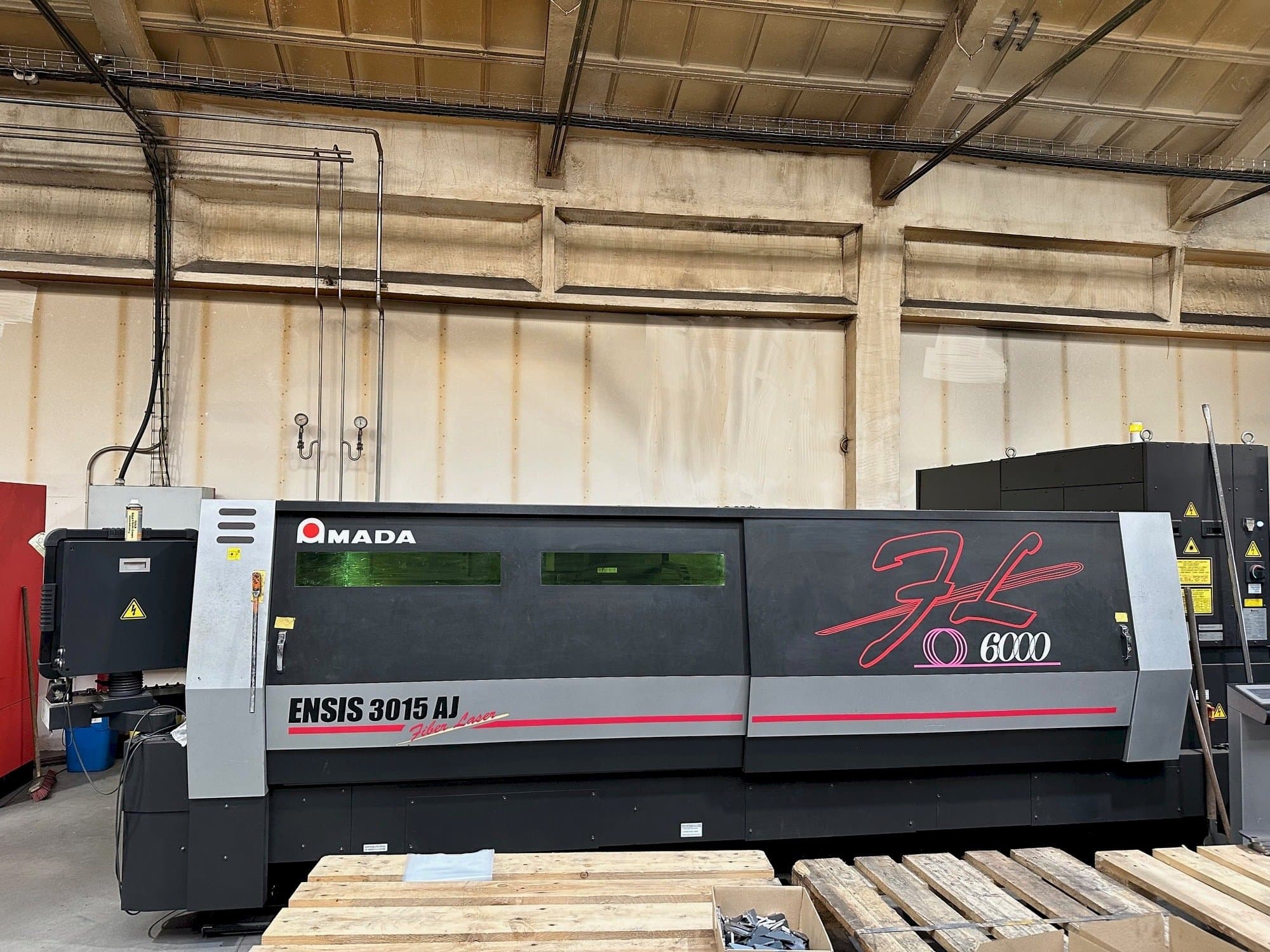 Front view of AMADA ENSIS-3015 AJ machine