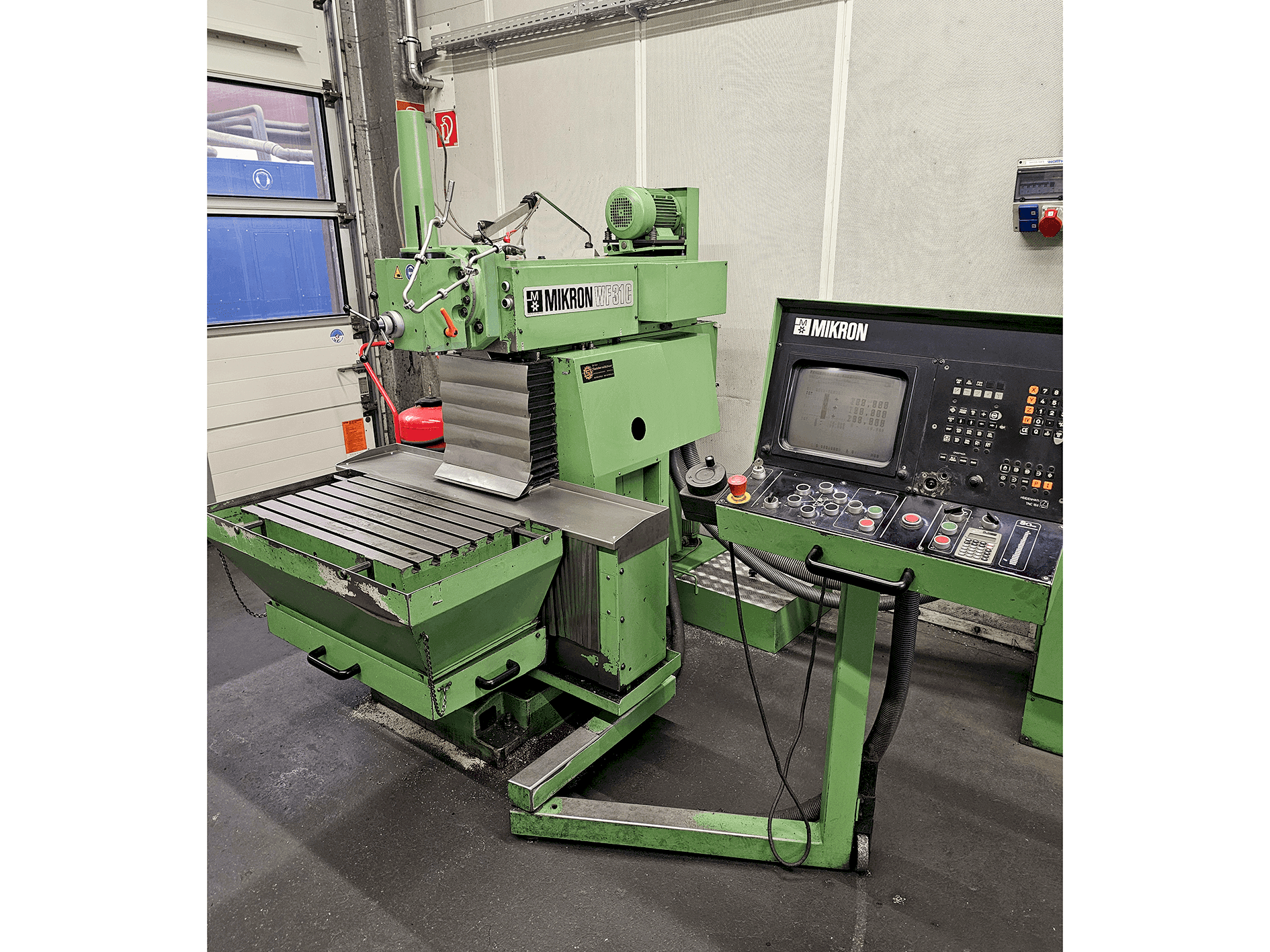 Front view of MIKRON WF-31C machine