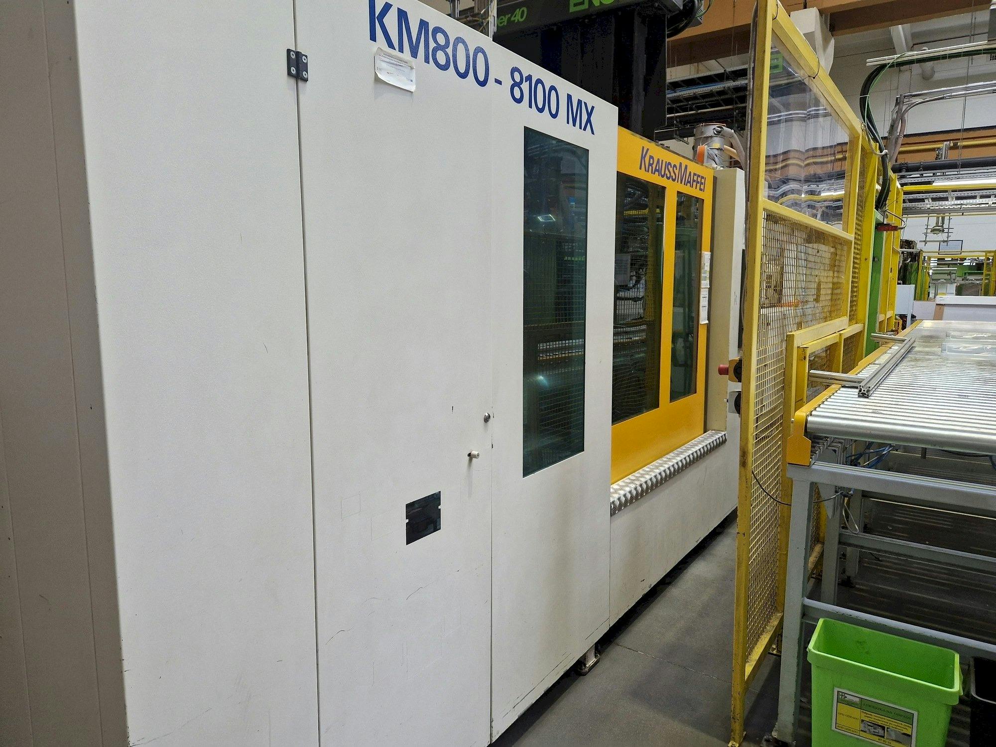 Left side view of Krauss Maffei 800-8100 MX  machine