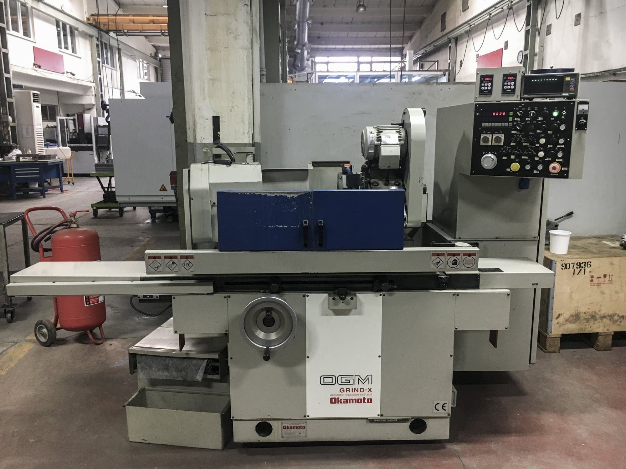 Front view of OKAMOTO OGM-250UDX Machine