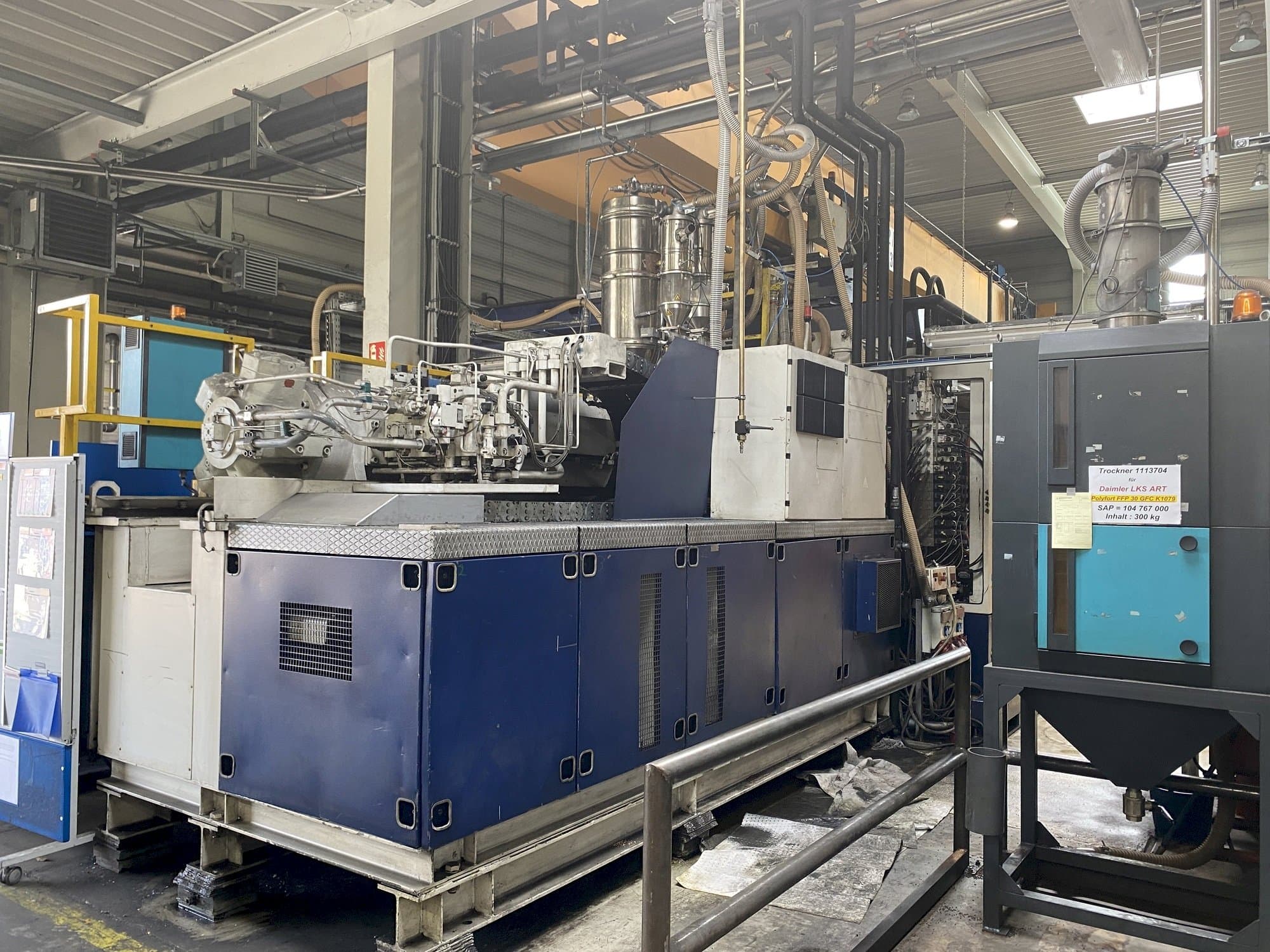 Front view of Krauss Maffei 1600-8000 MC machine