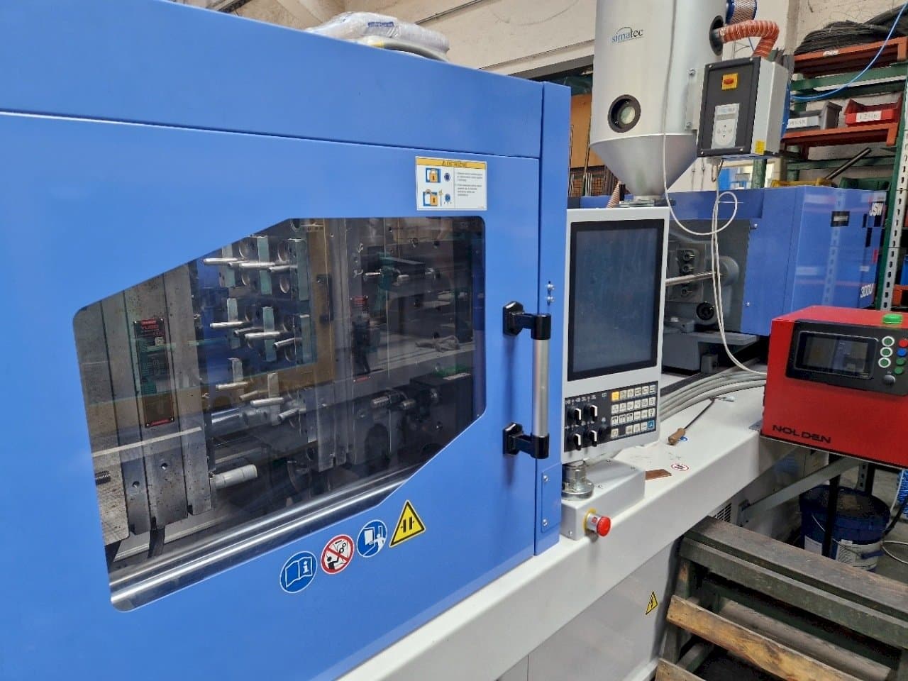 Left side view of JSW J180ADS-300U machine