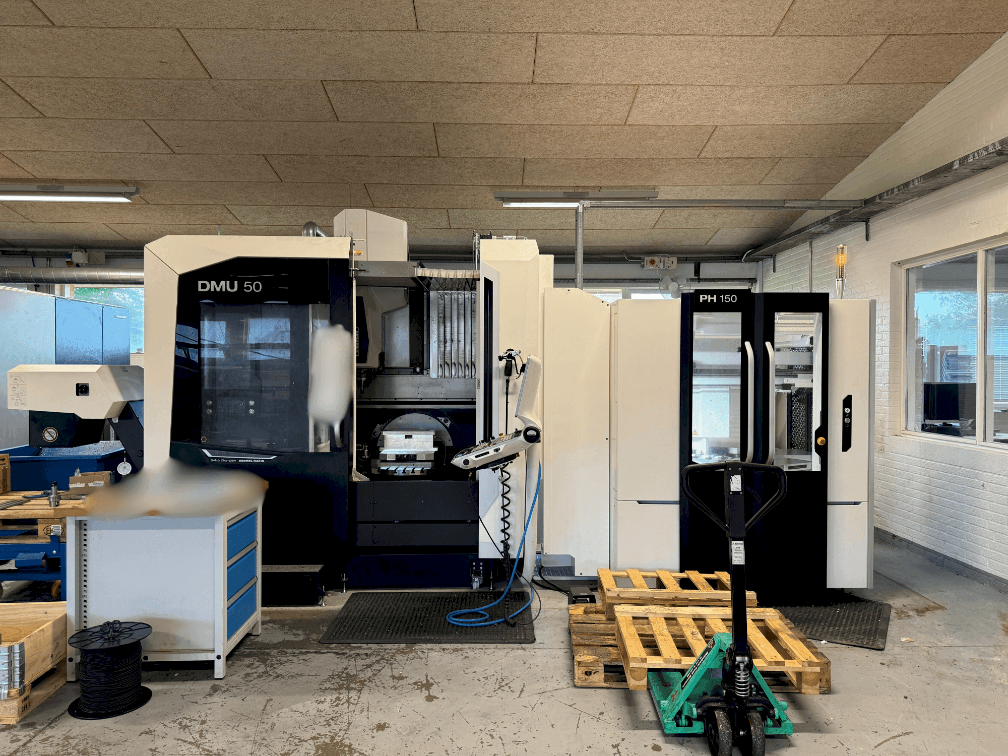 Front view of DMG MORI DMU 50 + PH 150 machine