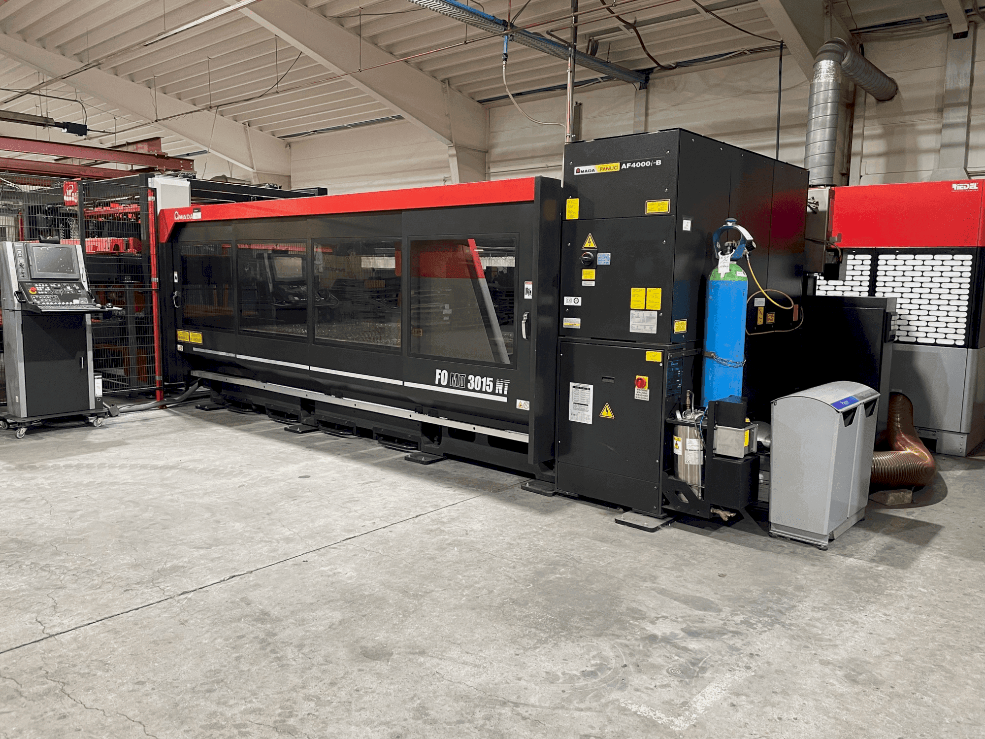 Front view of AMADA FOM2 3015 NT  machine