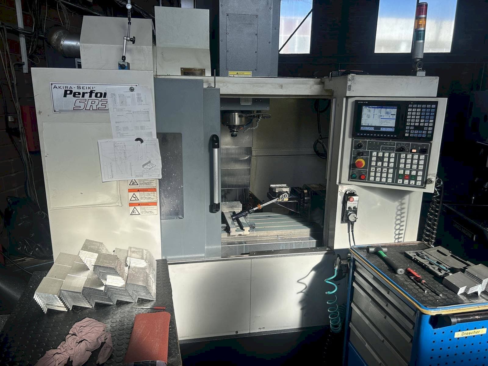 Front view of Akira Seiki SR3AXP machine