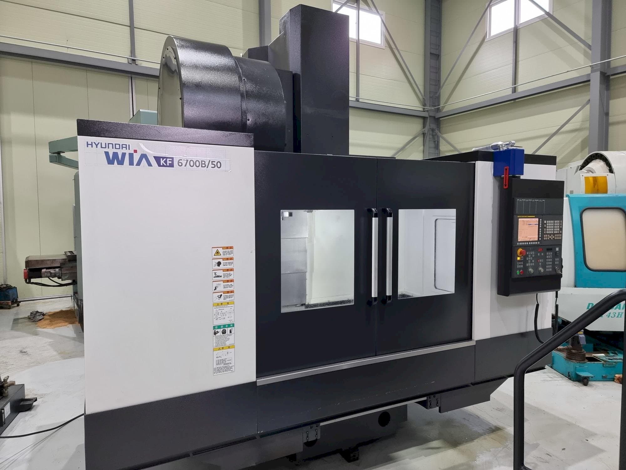 Front view of Hyundai Wia KF 6700B/50  machine