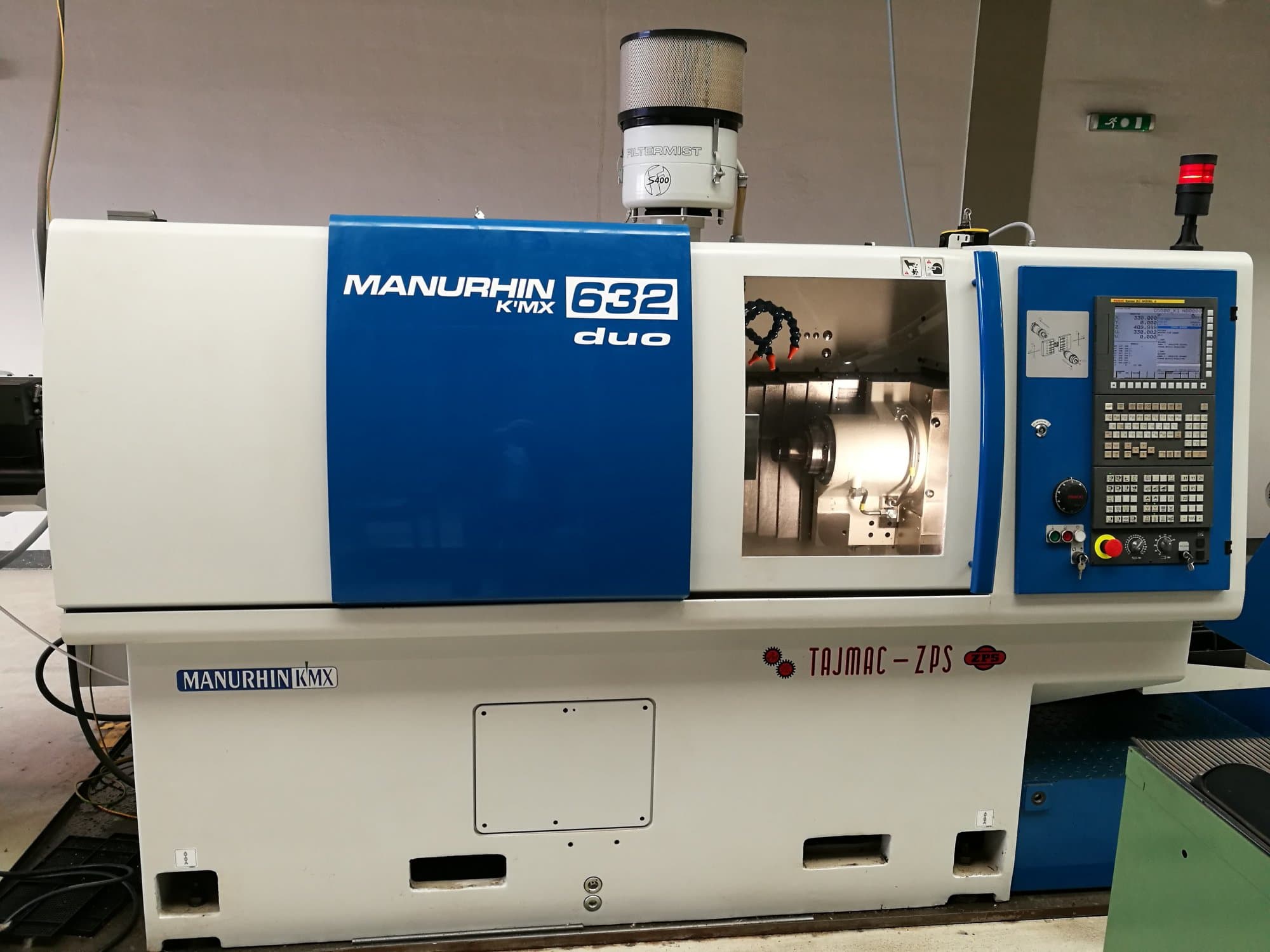 Front view of TAJMAC-ZPS MANURHIN K'MX 632 DUO machine