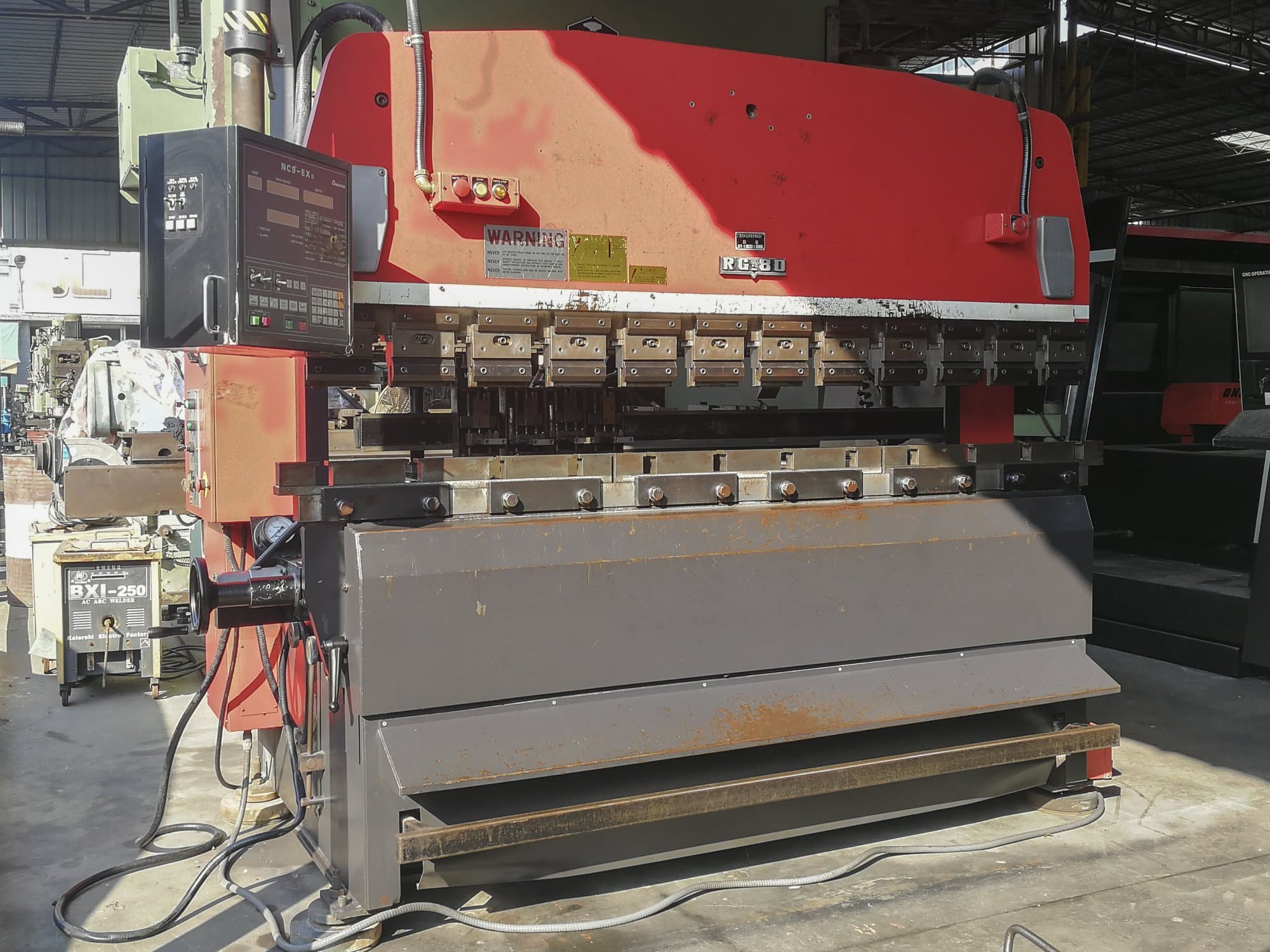 Front view of AMADA RG-80 Machine