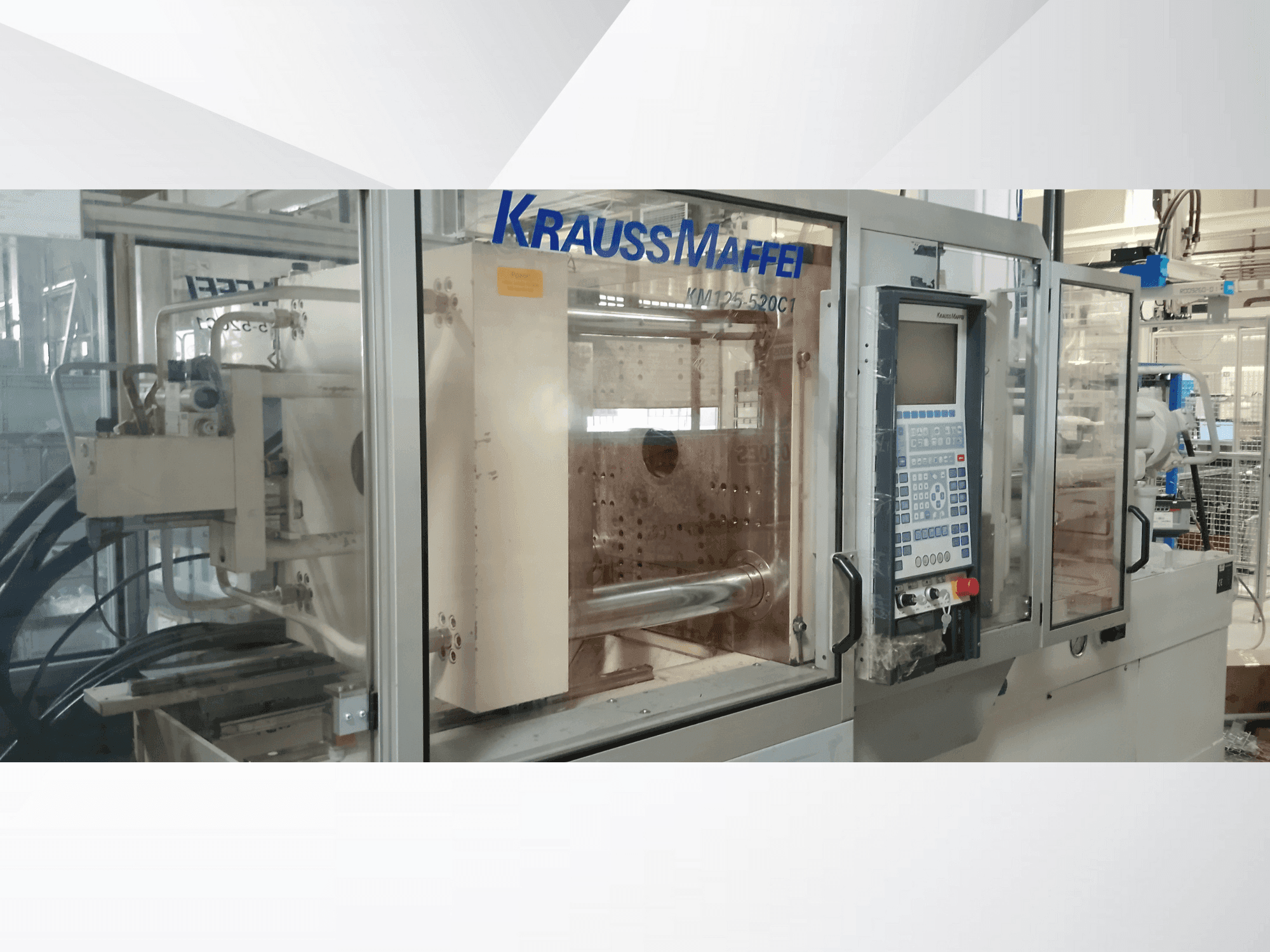 Front view of Krauss Maffei 125-520 C1 machine