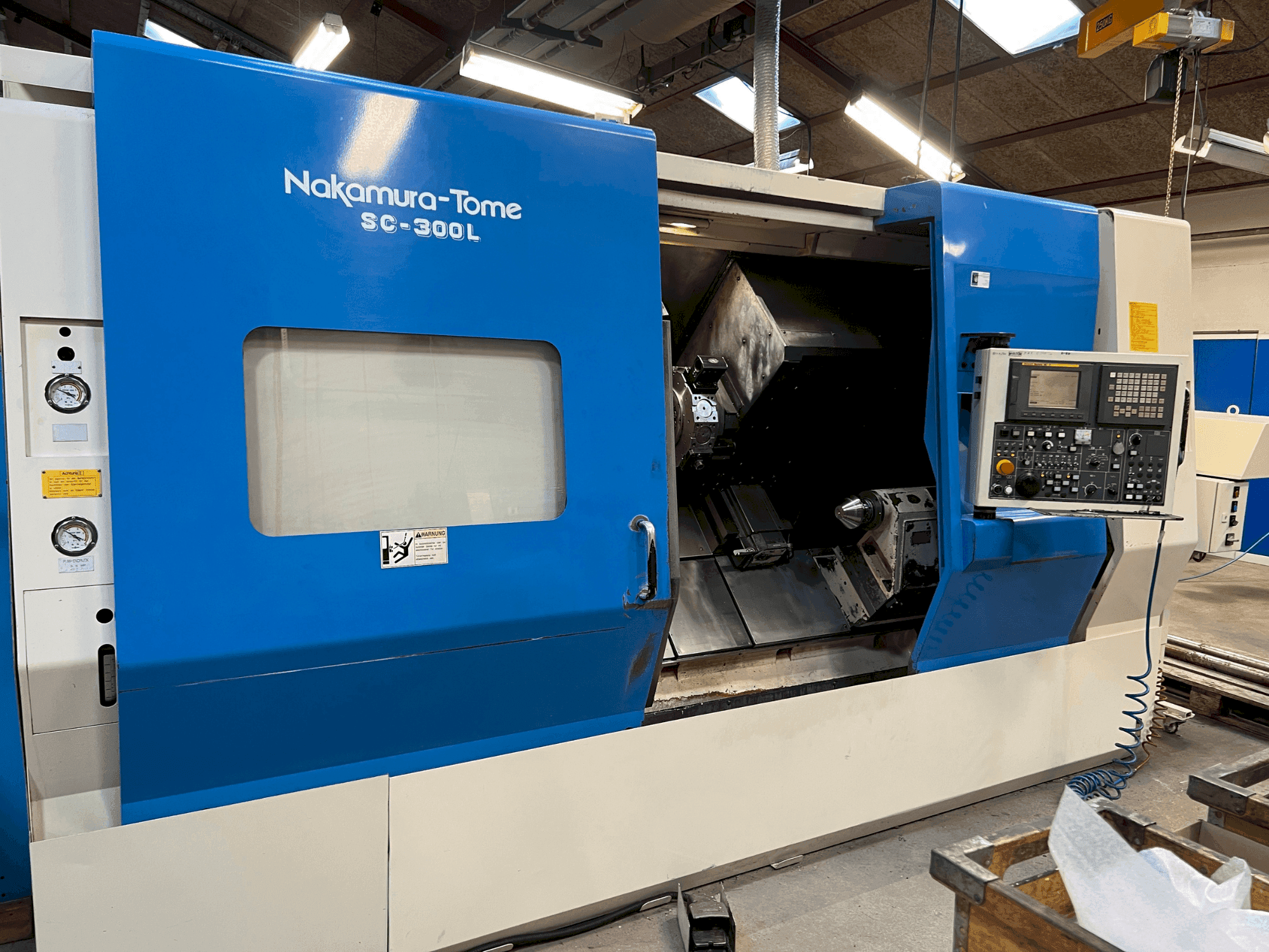 Front view of NAKAMURA SL 300LY machine