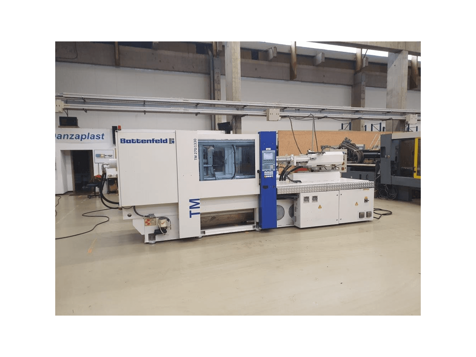 Front view of Battenfeld TM 2700 / 1330 B4 machine