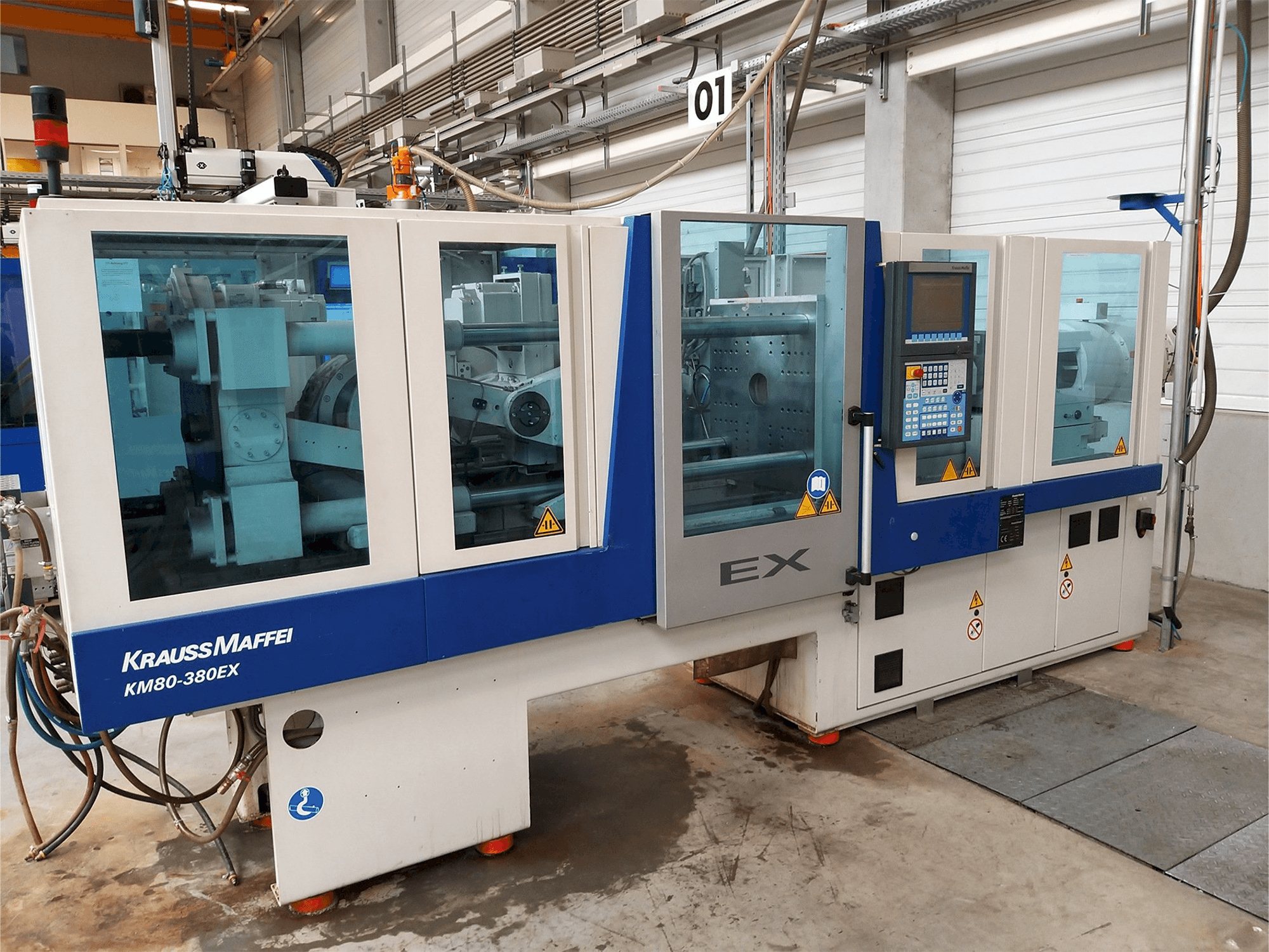 Front view of Krauss Maffei 80-380 Ex machine