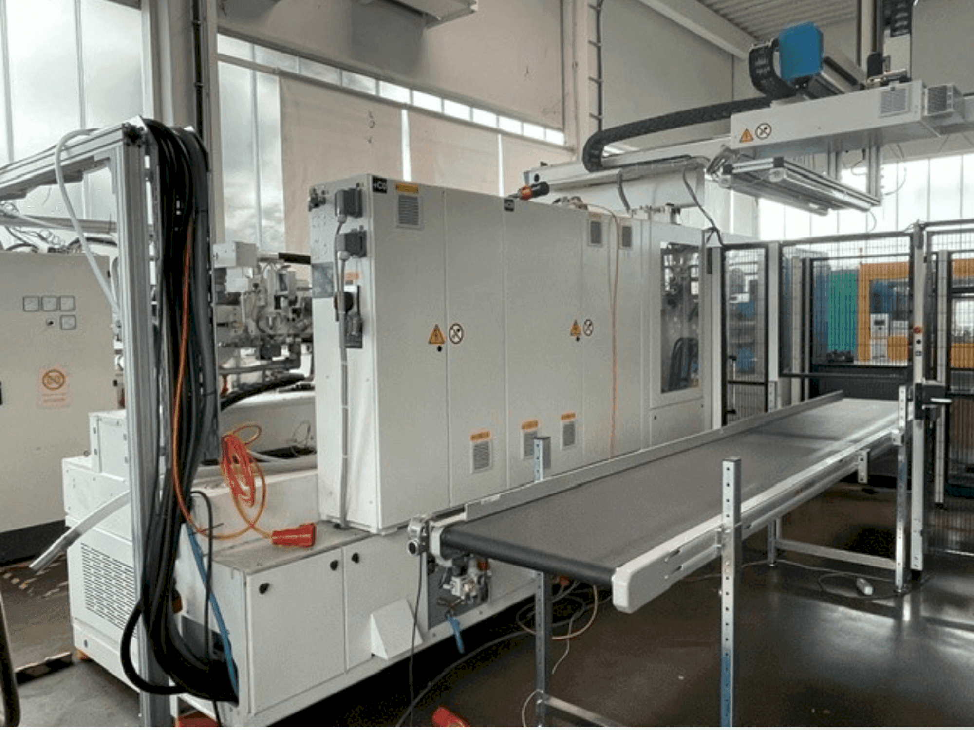 Front view of Krauss Maffei 300-1400 CX MC6 machine