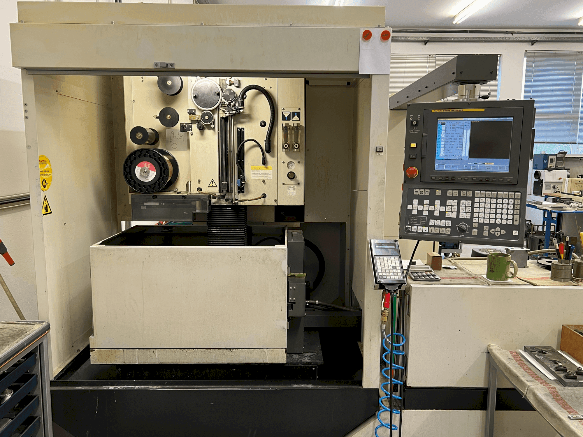 Front view of FANUC Alpha-0iC machine