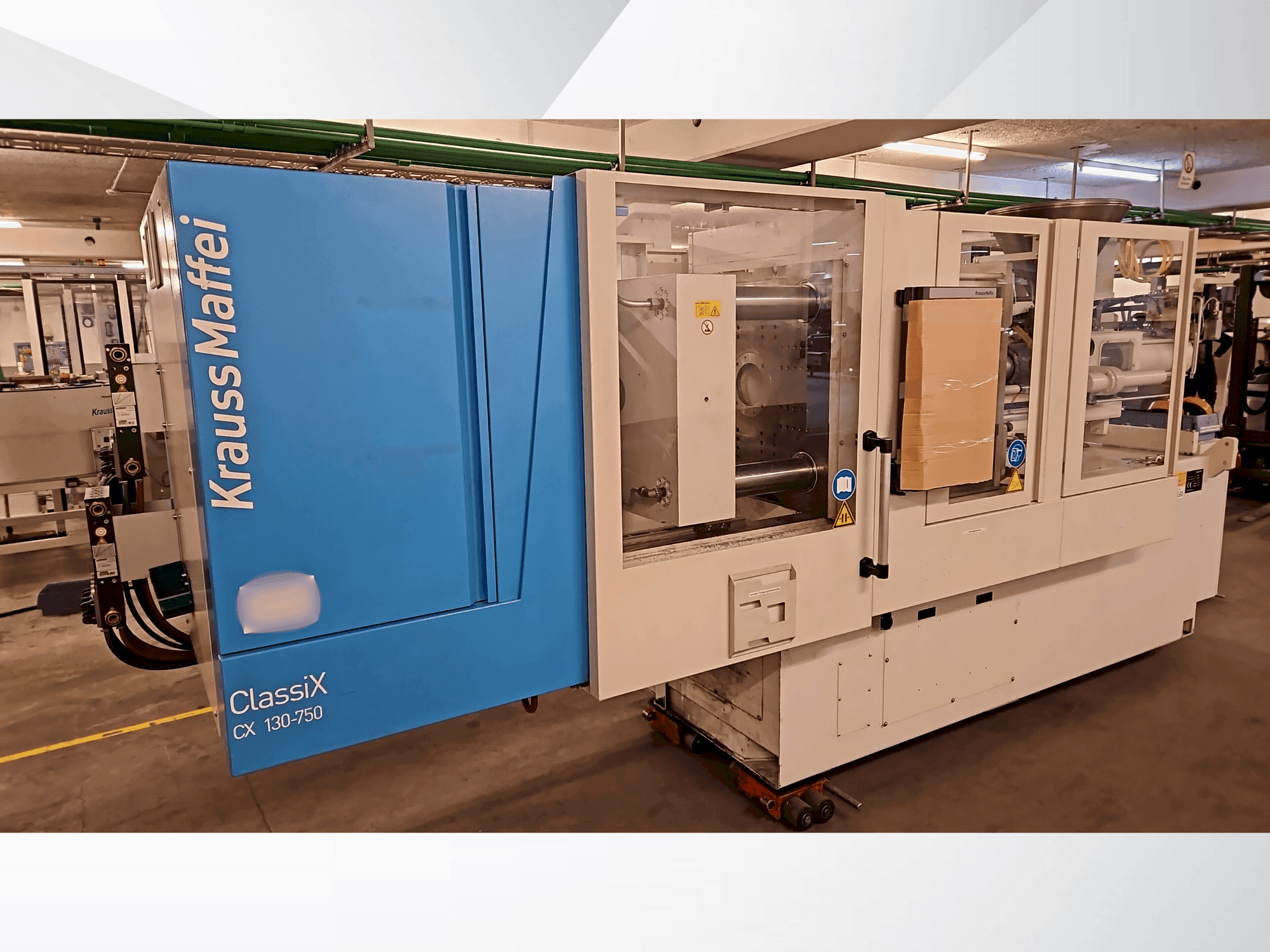 Front view of Krauss Maffei 130-750 CX machine