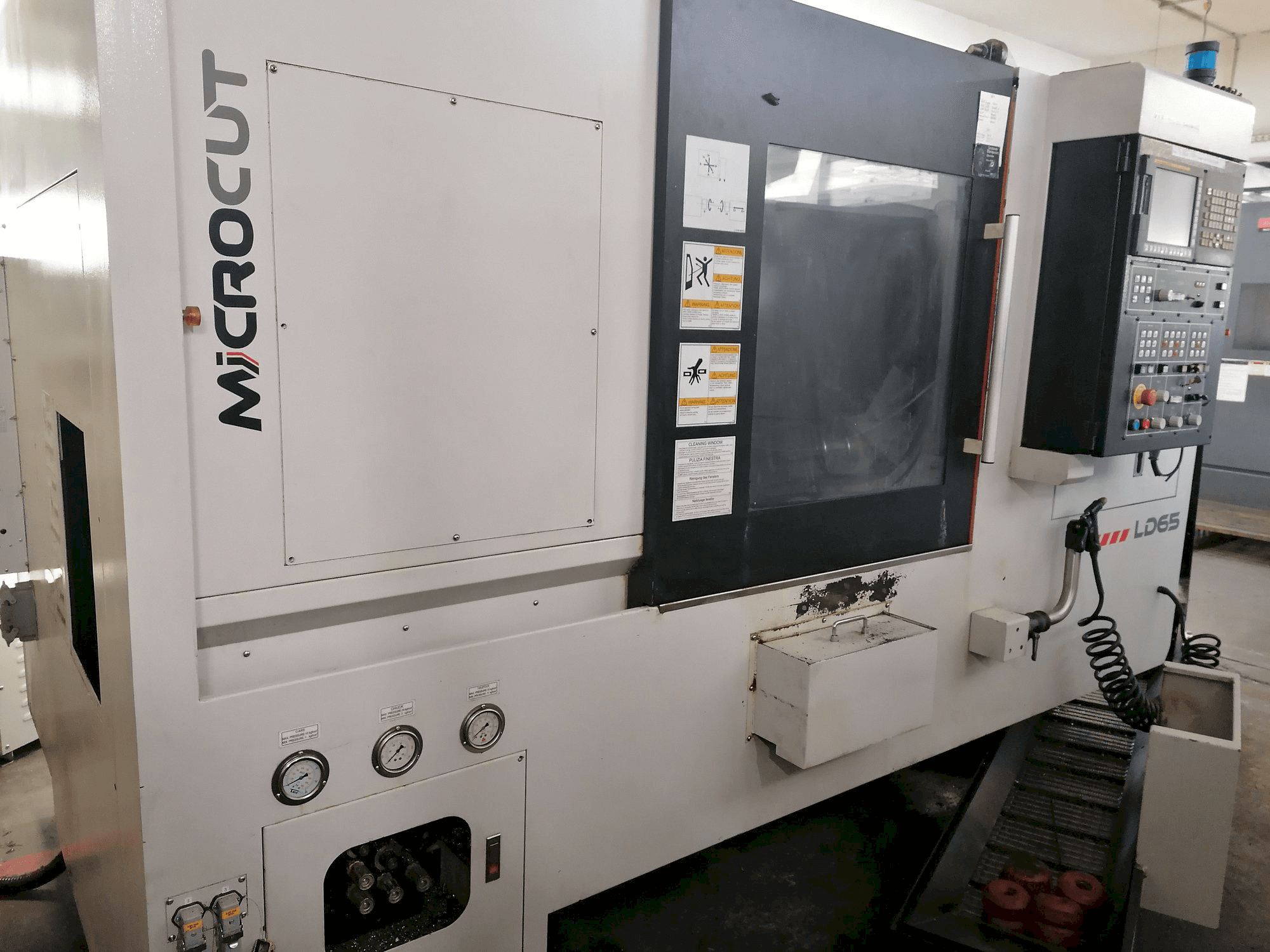 Front view of MICROCUT LD-65 machine