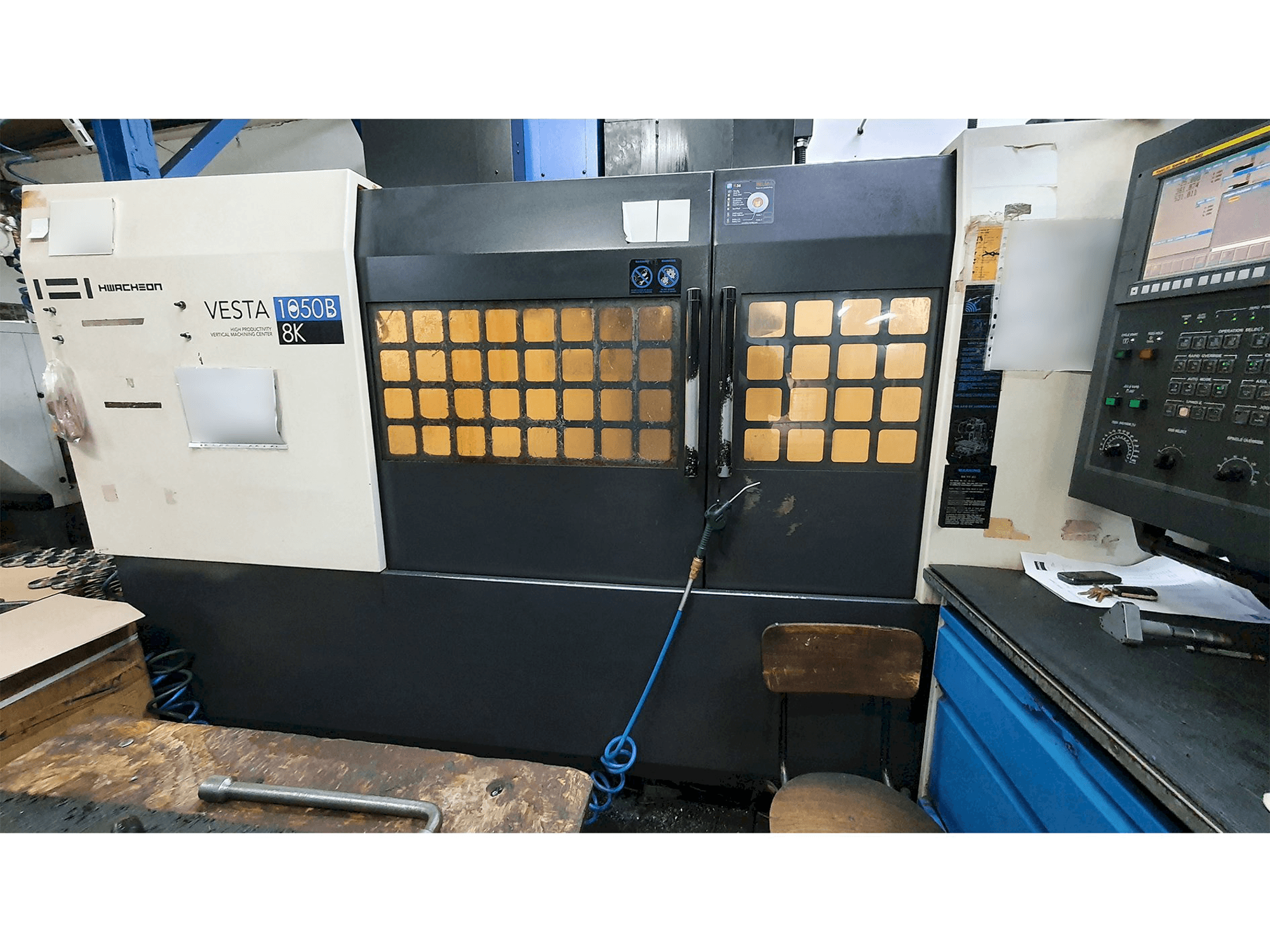 Front view of HWACHEON VESTA-1050B machine