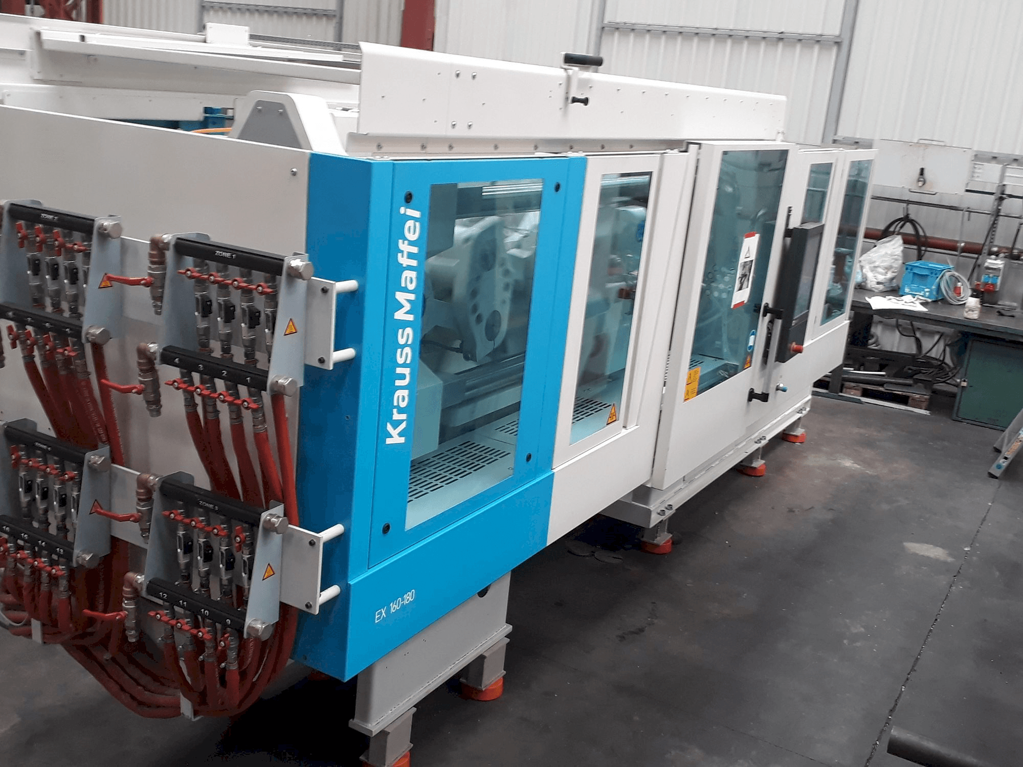 Left side view of Krauss Maffei 160-180 EX machine