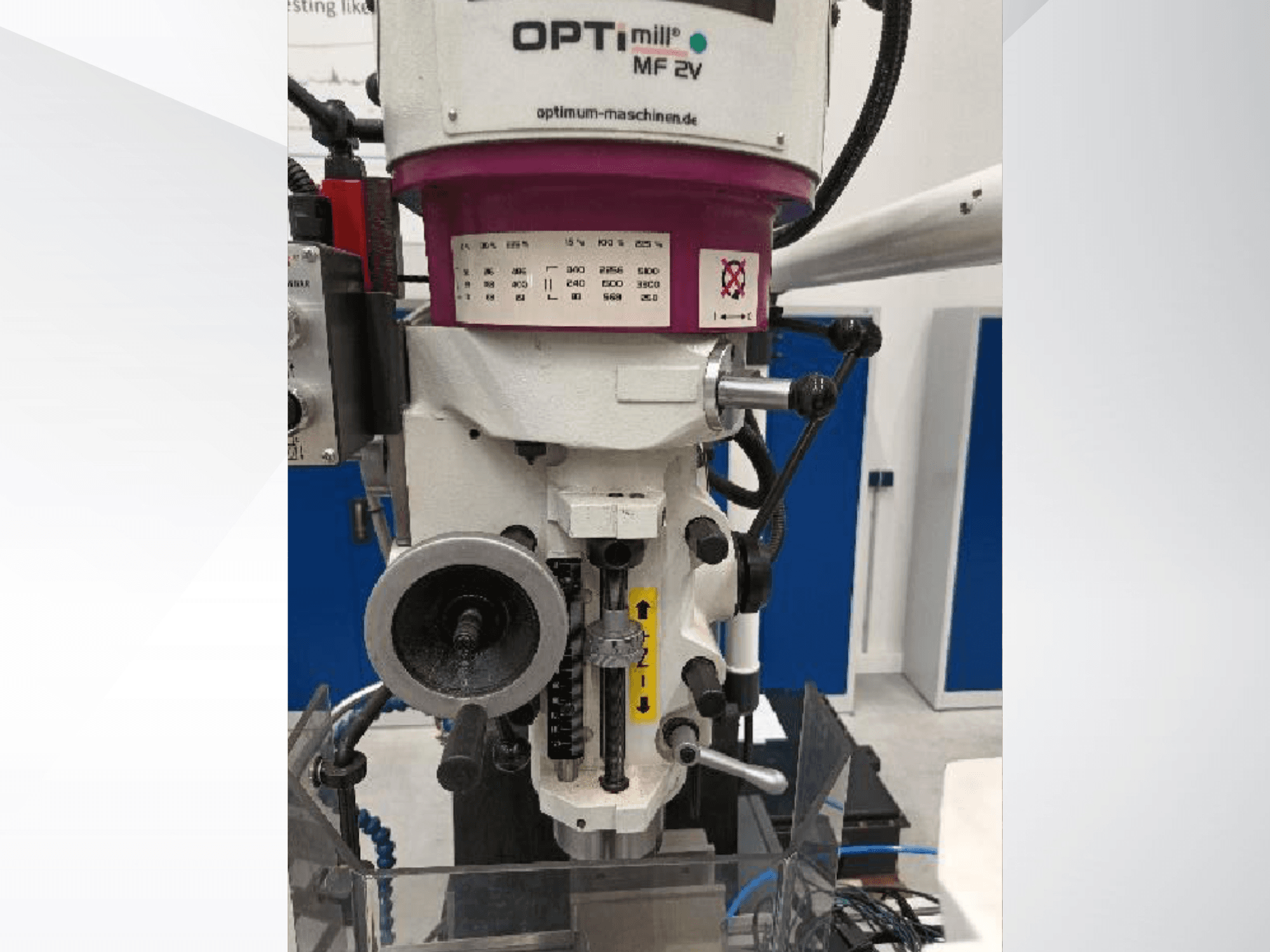 Front view of Optimum OPTImill MF 2V vertical machining centre, showcasing control panel and tool holder.