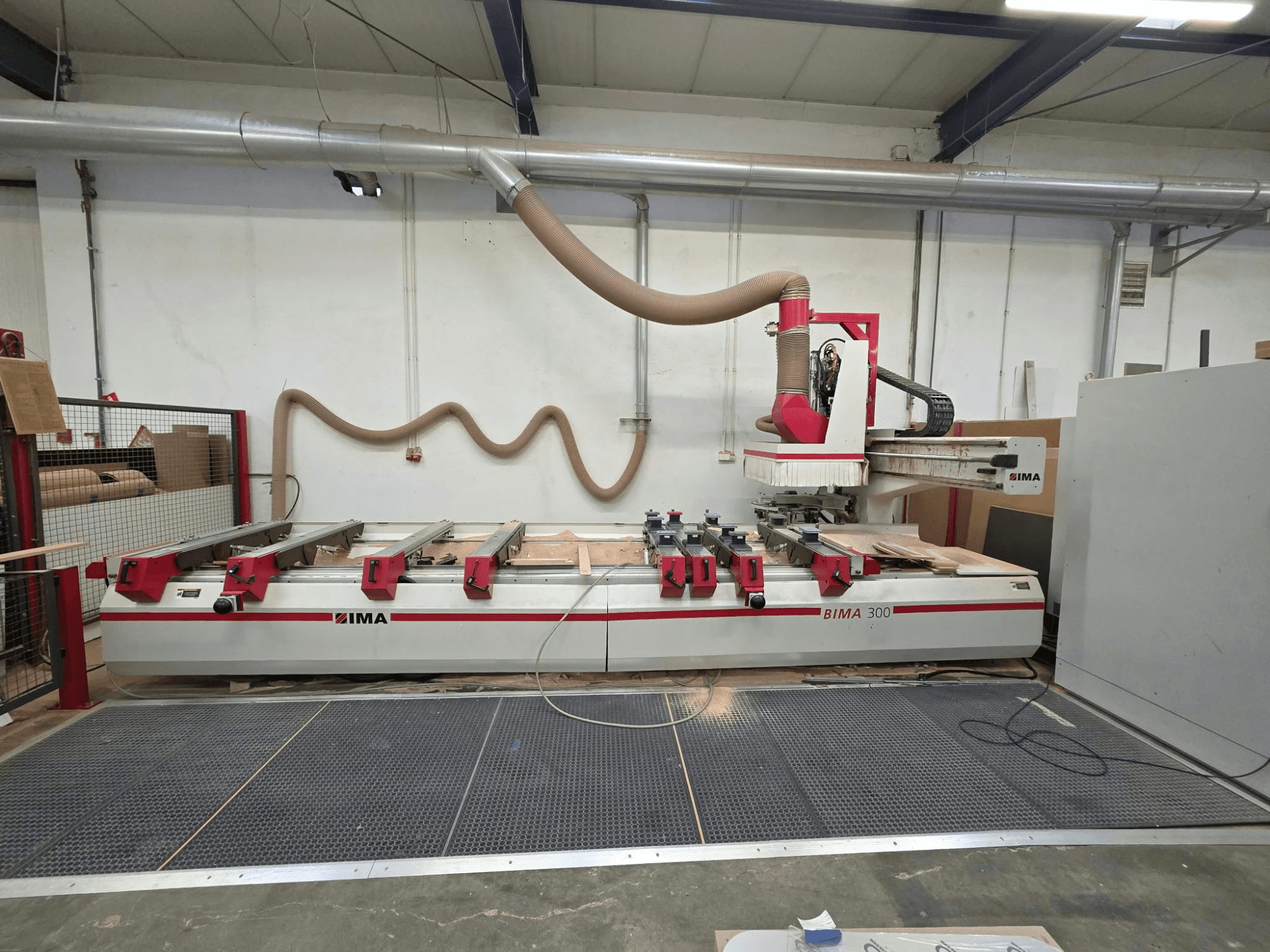 CNC Wood Machining Centre IMA BIMA 300, front view, featuring a multi-axis tool and dust extraction system.