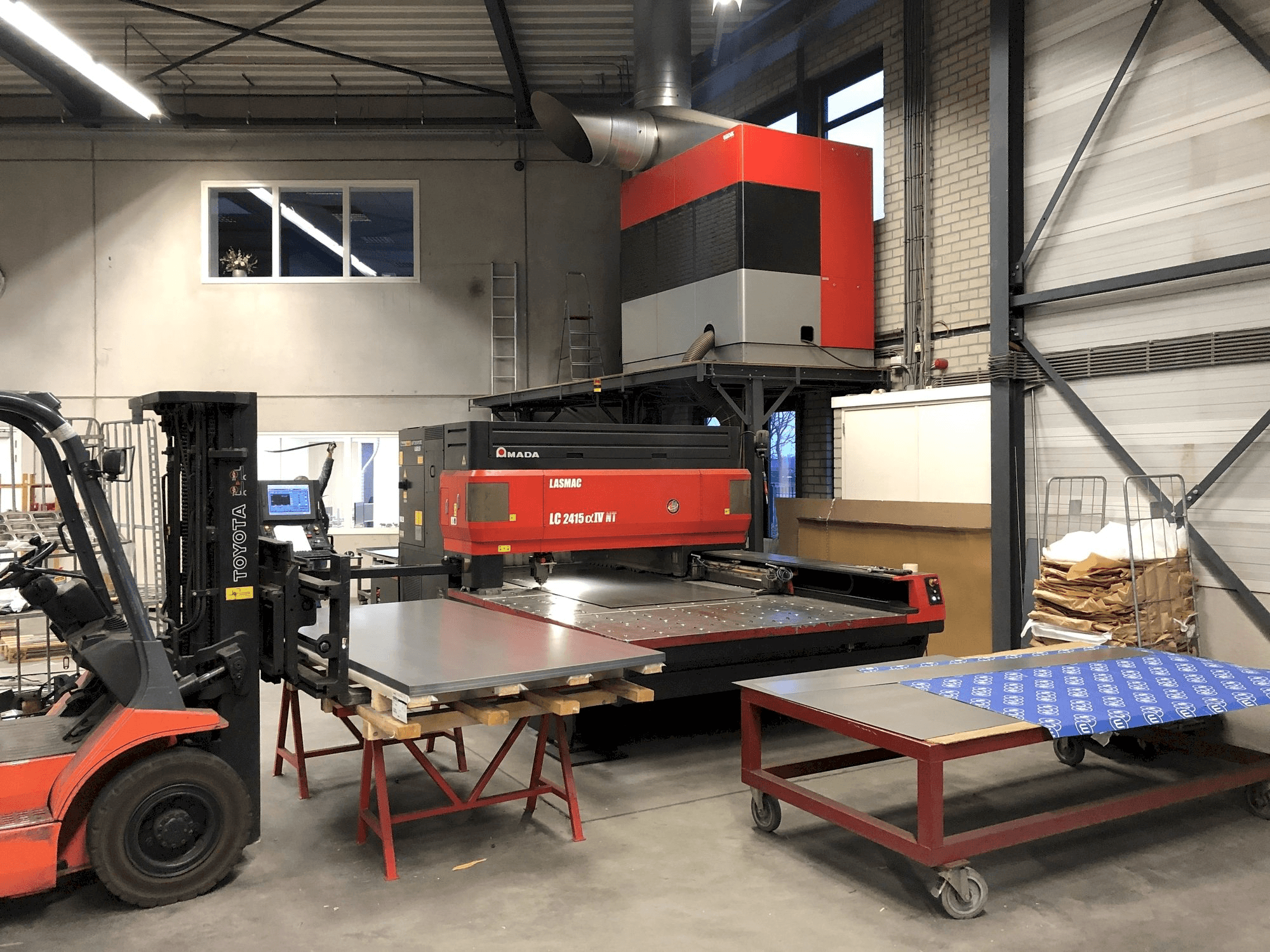 Front view of AMADA LC 2415 Alpha IV NT machine