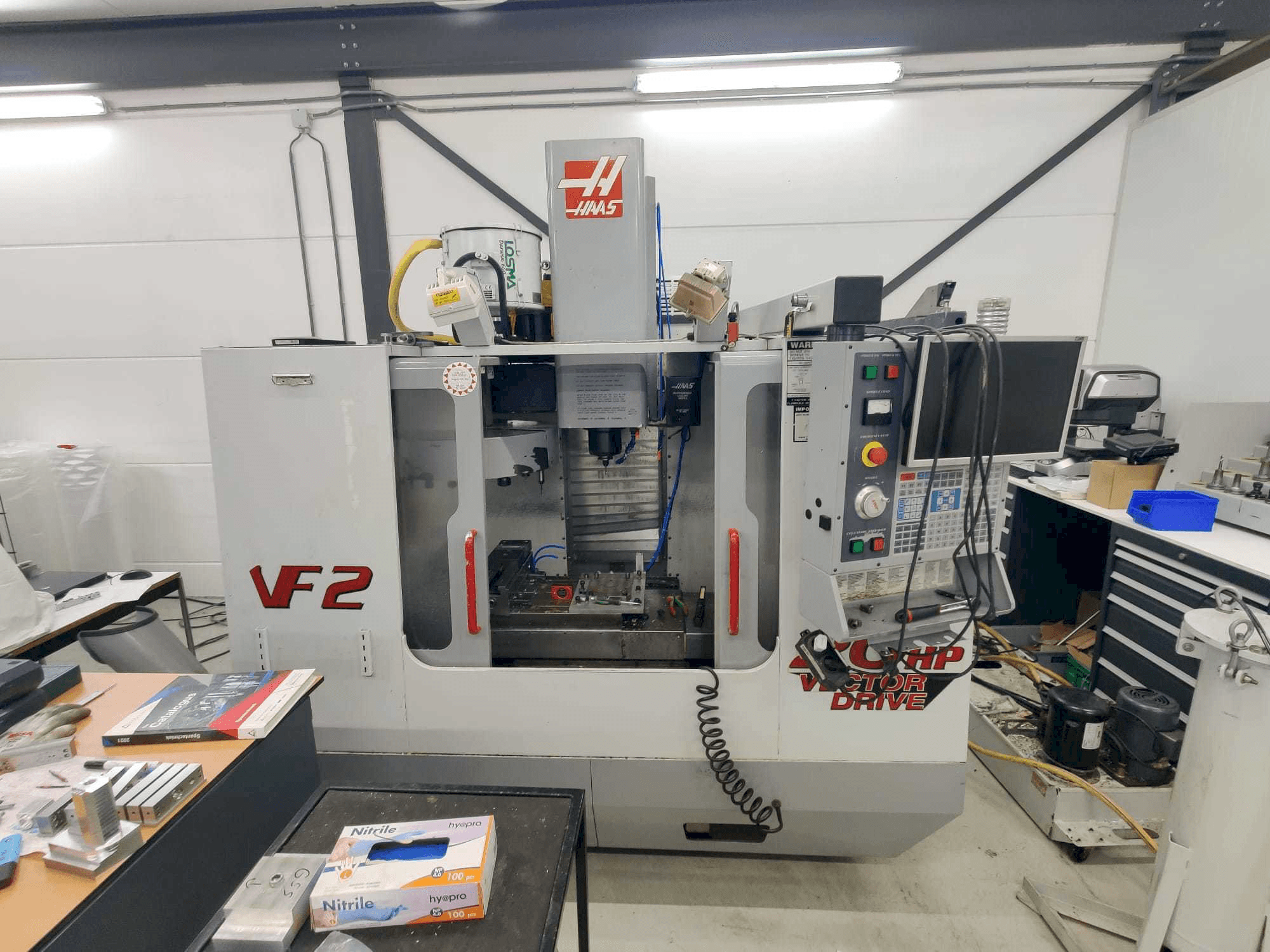 Front view of HAAS VF2HE machine