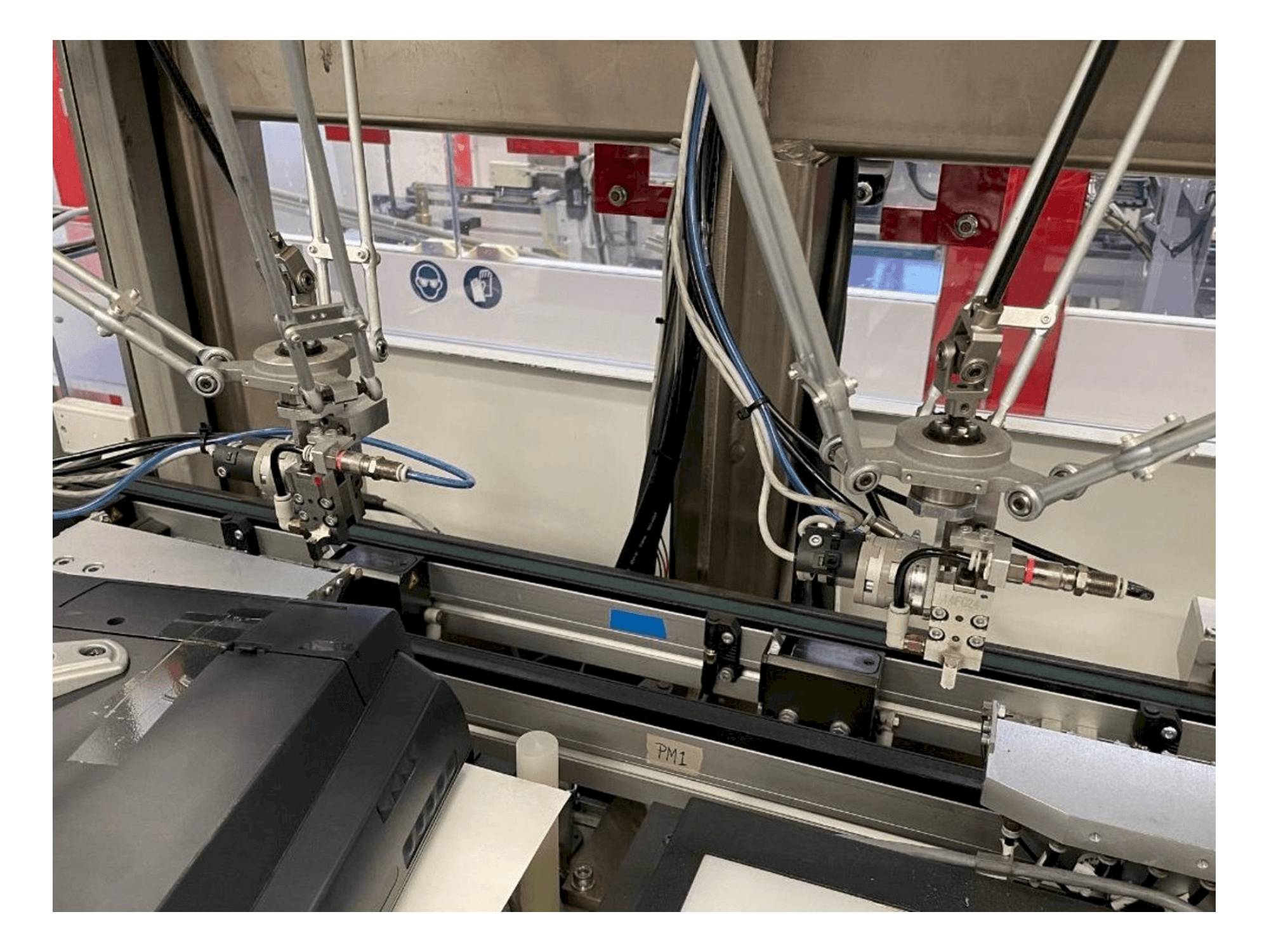 Front view of IMS Tattoo Assembly Line machine