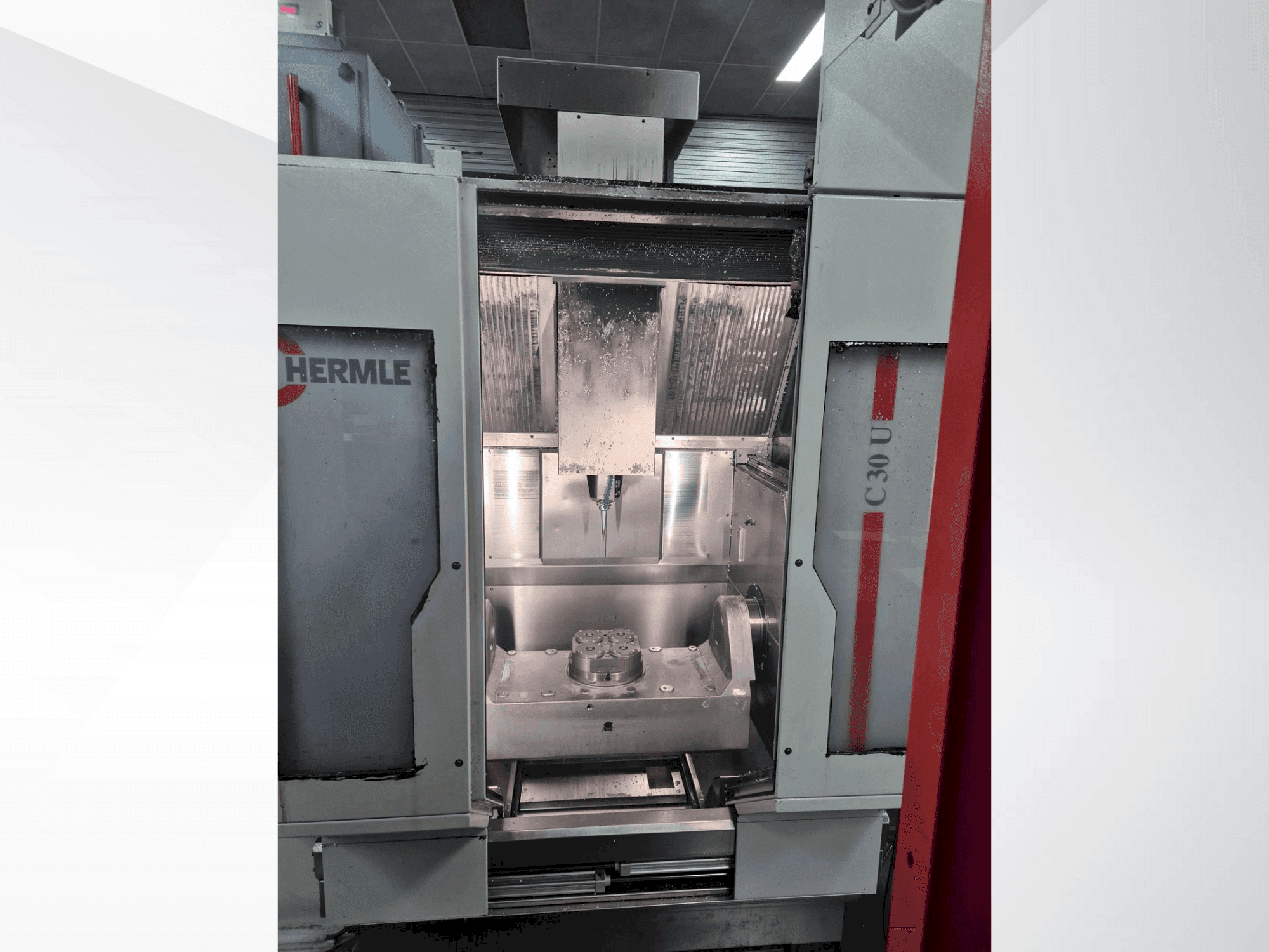 Front view of HERMLE C30U + RS Automation machine