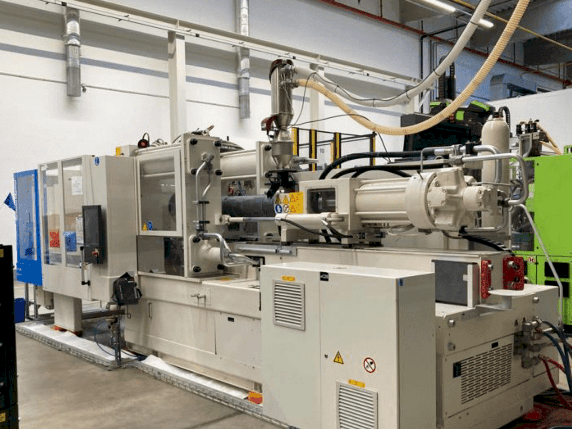 Front view of Krauss Maffei 420-2000 CX machine